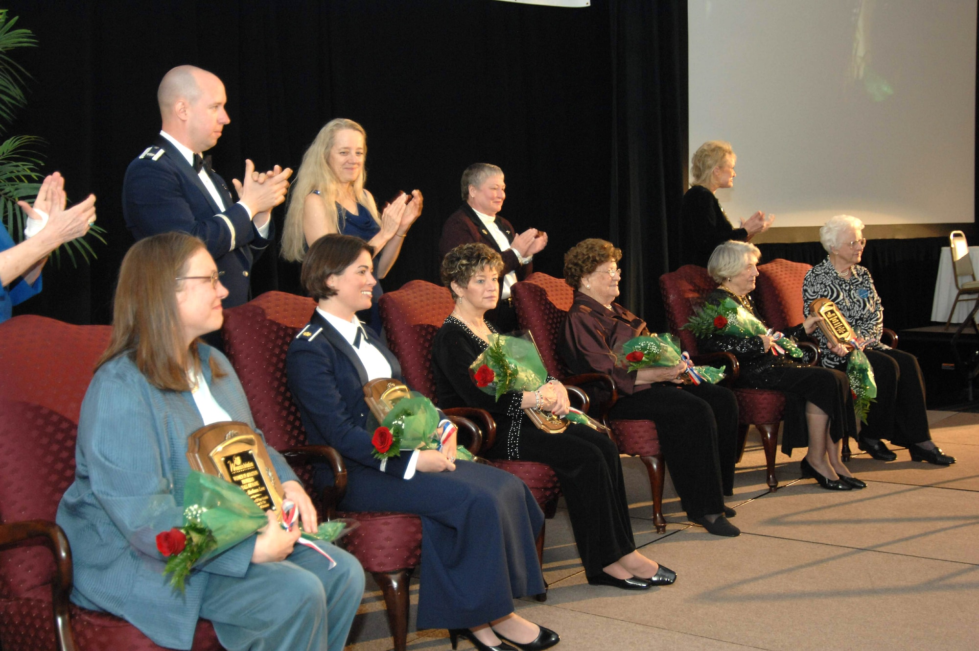 Maj. Nicole Malachowski sits with other female aviators who were being inducted into the Women in Aviation International's Pioneer Hall of Fame March 15 at the Town and Country Convention Center in San Diego. The major, who piloted the Thunderbirds right wing No. 3, was recognized for being the first female pilot to be part of a U.S. military flight demonstration team. (U.S. Air Force photo/Master Sgt. Bill Kimble) 
