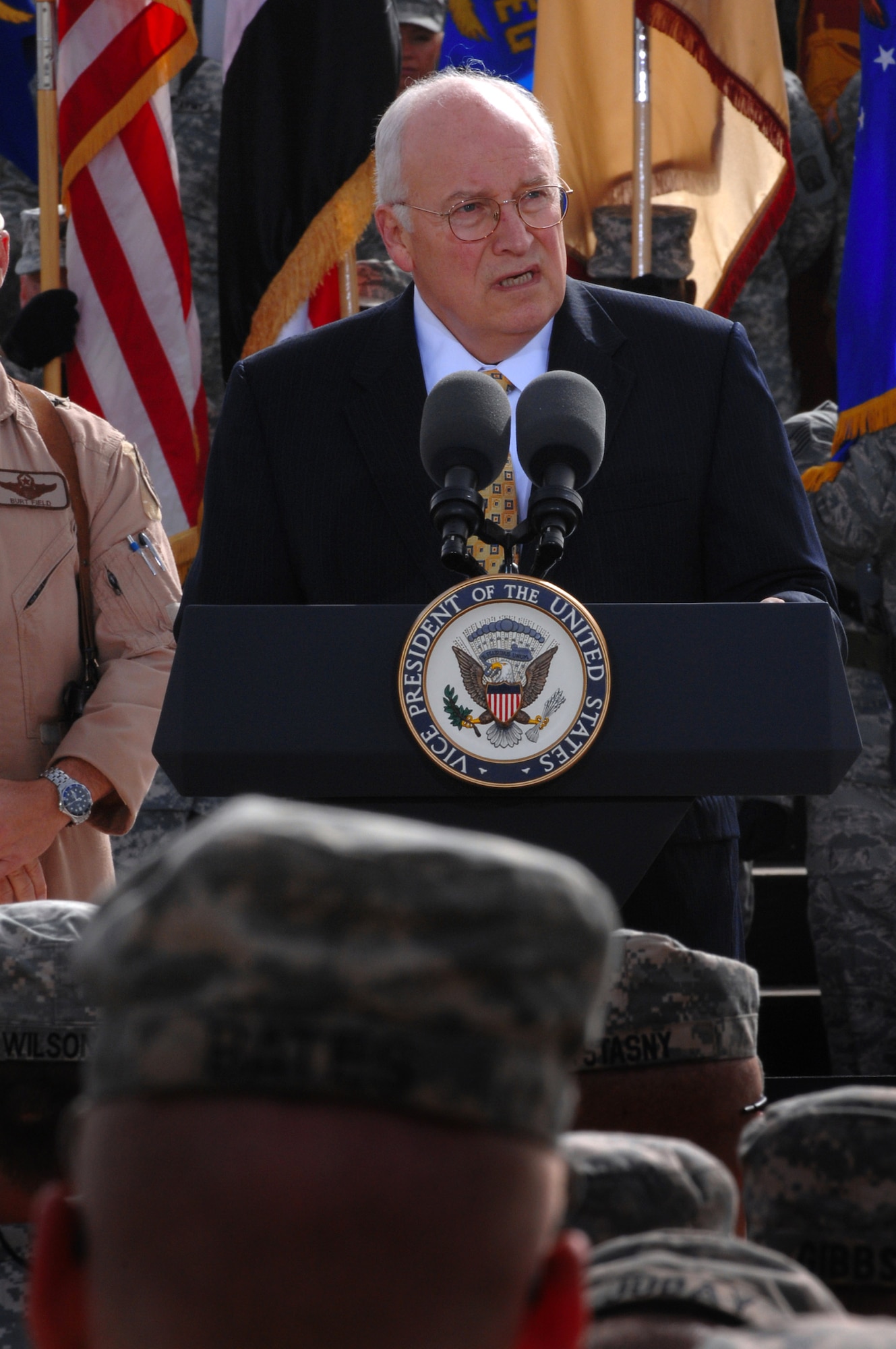 Vice President Dick Cheney speaks to uniformed servicemembers March 18 at Balad Air Base, Iraq. The vice president came to the base to visit deployed military men and women serving in support of Operation Iraqi Freedom. (U.S. Air Force photo/Senior Airman Julianne Showalter) 
