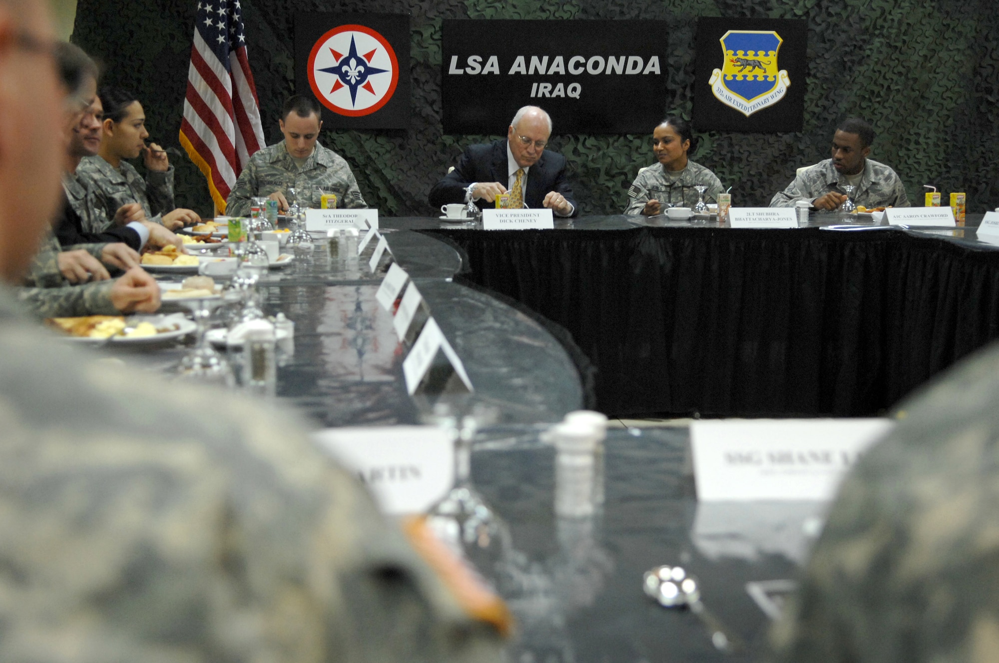 Vice President Dick Cheney meets a select group of Airmen, Soldiers and Sailors for breakfast March 18 at Balad Air Base, Iraq. The vice president came to the base to visit deployed servicemembers in support of Operation Iraqi Freedom. (U.S. Air Force photo/Senior Airman Julianne Showalter) 
