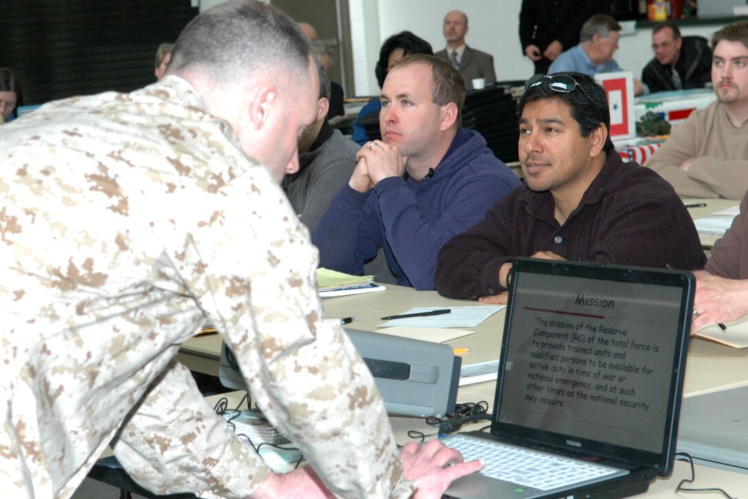 GRISSOM AIR RESERVE BASE, Ind., -- Lt. Col. Carroll Harris, Det 1, Communications Company, provides a mission briefing to United States Marine Corps members on inactive-reserve status. The briefings were held as part of an IRR muster designed to educate and update those local Marines on IRR status. Thirty-two Marines participated in the muster. (U.S. Air Force photo/Tech. Sgt. Doug Hays)