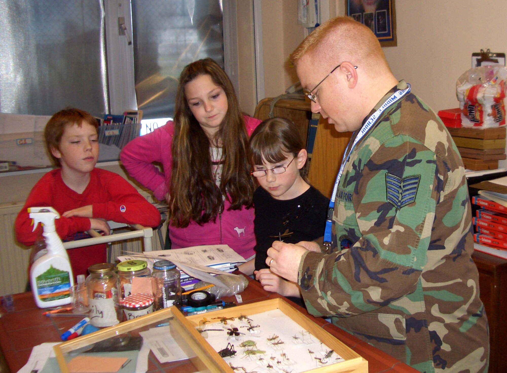 SPANGDHALEM AIR BASE, Germany – Tech. Sgt. Earl Thomas, 52nd Aerospace Medicine Squadron Optometry Flight, teaches Bitburg Middle School students about entomology. Airmen with the 52nd Medical Group are working with school’s science department to increase student’s awareness and interest in science. (Courtesy photo)