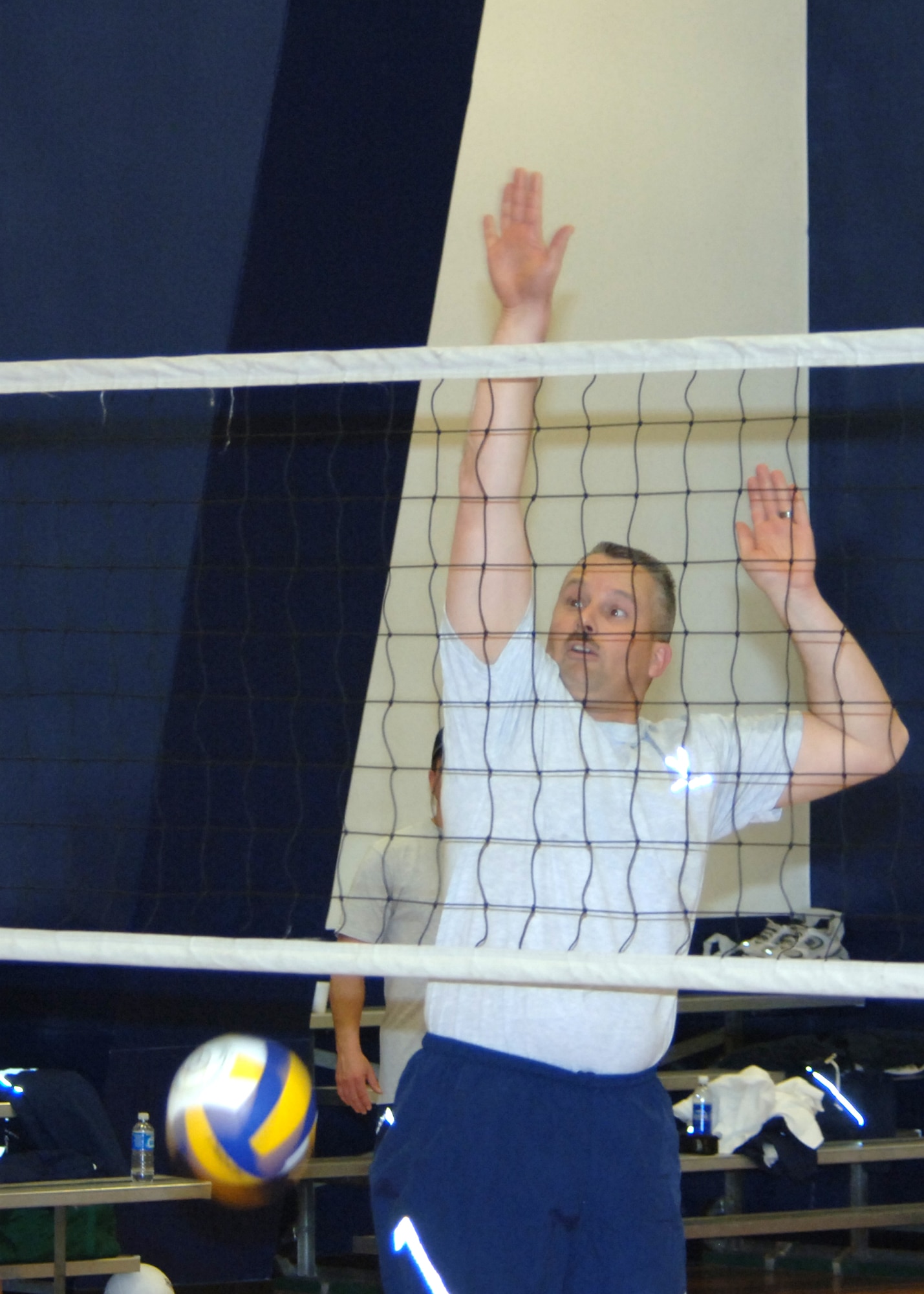 MISAWA AIR BASE, Japan -- Chief Master Sgt. select Jeffrey Felty, with the 35th Civil Engineer Squadron, spikes the ball over the net during the Eagles vs Chiefs volleyball game at the Potter Fitness Center, March 14, 2008.  The Chiefs scored victory in the best-out-of-five games competition.  (U.S. Air Force photo by Senior Airman Robert Barnett)