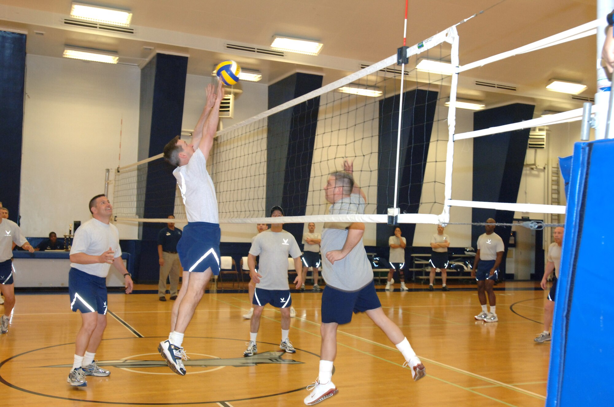 MISAWA AIR BASE, Japan -- Col. T.J. O'Shaughnessy, 35th Fighter Wing commander, faces off with Command Chief Master Sgt. Ricky Price during the Eagles vs. Chiefs volleyball game at the Potter Fitness Center, March 14, 2008.  The competition led to the Chiefs victory.  (U.S. Air Force photo by Senior Airman Robert Barnett)