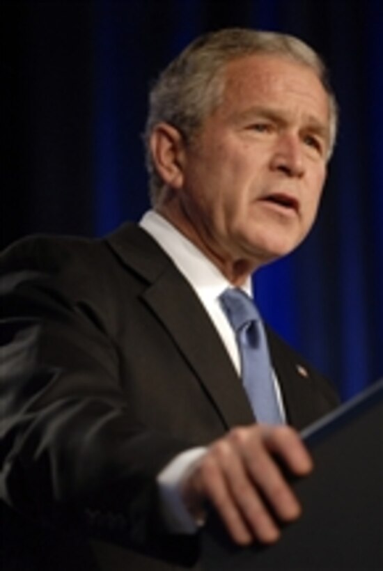 President George W. Bush speaks to the audience in the Pentagon auditorium on March 19, 2008.  Bush addressed members of the Armed Forces, Department of Defense and Department of State employees about the progress made in Iraq and the Global War on Terror.  