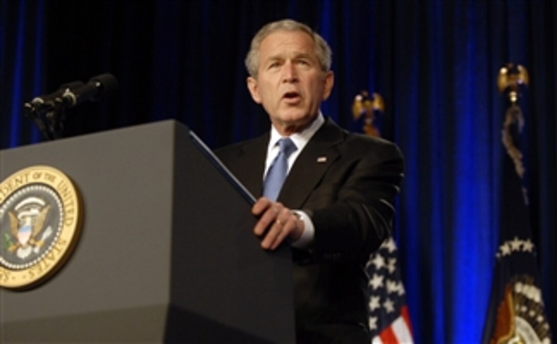 President George W. Bush speaks to the audience in the Pentagon auditorium on March 19, 2008.  Bush addressed members of the Armed Forces, Department of Defense and Department of State employees about the progress made in Iraq and the Global War on Terror.  