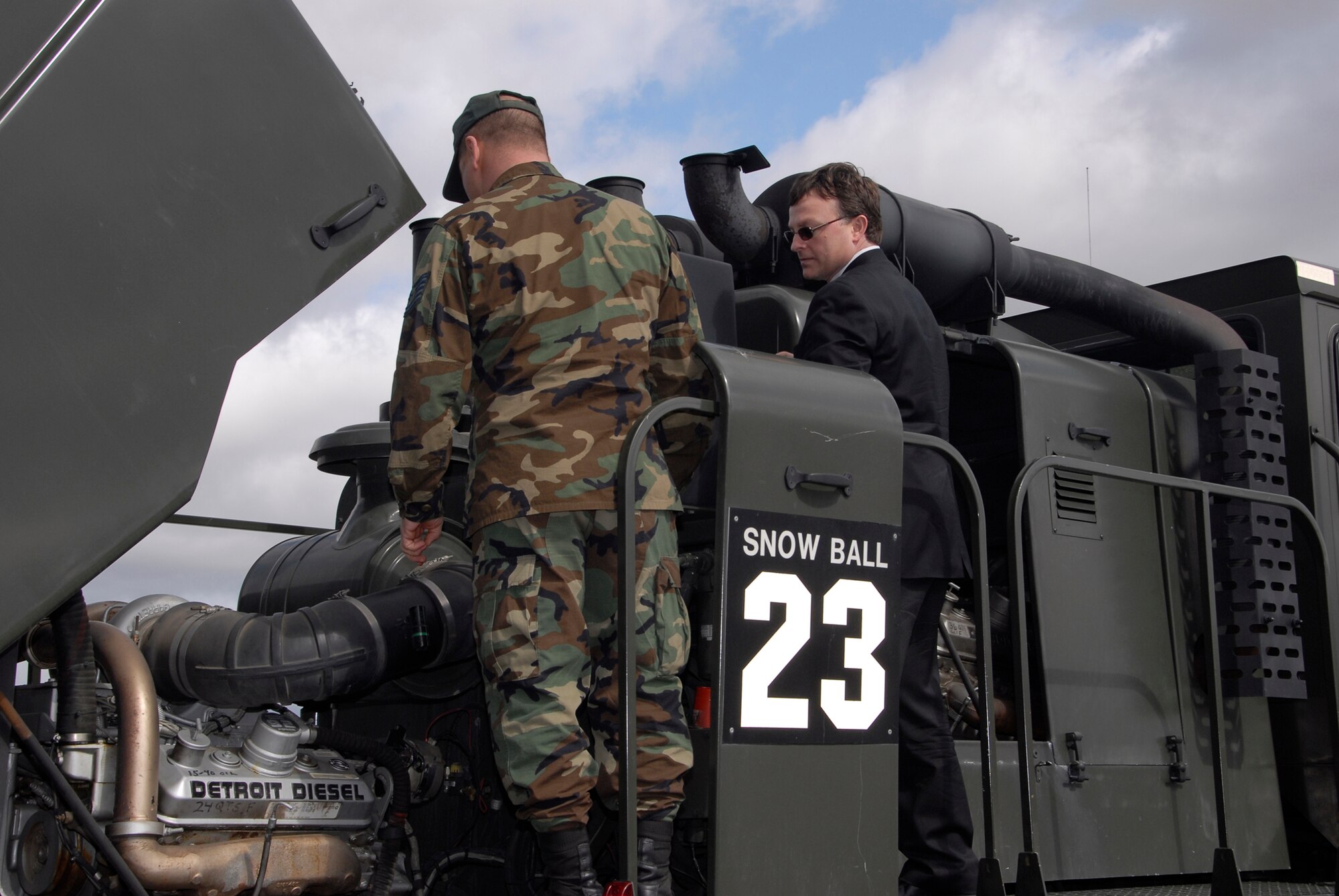 FAIRCHILD AIR FORCE BASE, Wash. – Spokane County Commissioner Mark Richard, right, takes a tour of the snow equipment used by the 141st Air Refueling Wing, Washington Air National Guard, in February when Guard members responded to the local snow emergency. The Guard’s actions saved lives, said the commissioner, because without their help emergency vehicles could not have reached some homebound Spokane residents. (Washington Air National Guard photo / Senior Master Sgt. Bob Thackton)