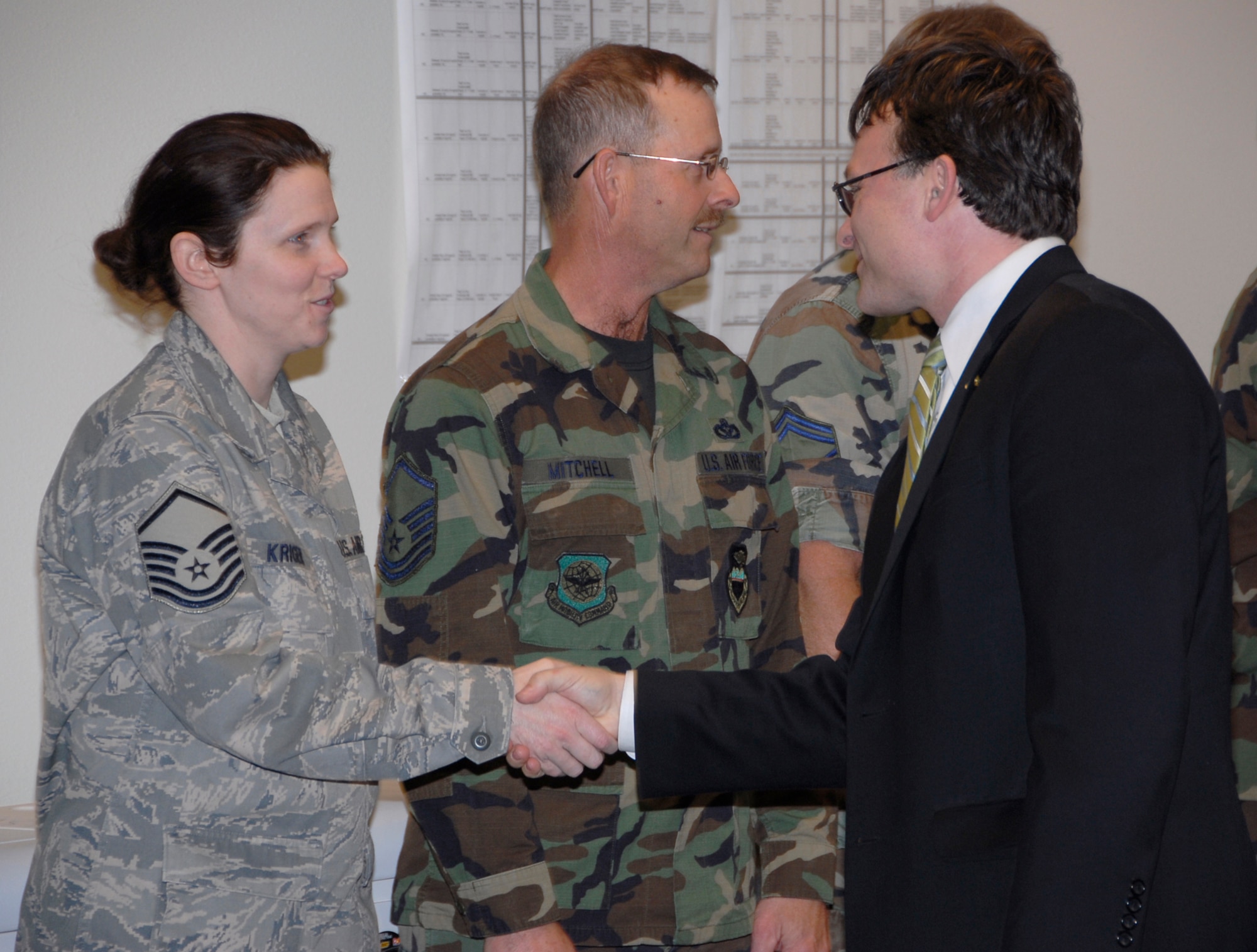 FAIRCHILD AIR FORCE BASE, Wash. – Spokane County Commissioner Mark Richard, right, greets snow crew members here from the 141st Air Refueling Wing, Washington Air National Guard, March 18. The Guard was called into service in February when Governor Chris Gregoire declared a state of emergency resulting from excessive snowfall. (Washington Air National Guard photo / Senior Master Sgt. Bob Thackton)
