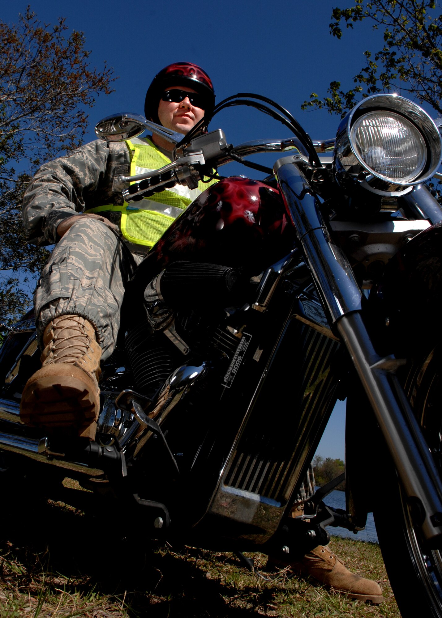 MOODY AIR FORCE BASE, Ga. -- Staff Sgt. Robert Marlow, 347th Operational Support Squadron aircrew flight equipment member,  sits on his Honda Shadow Aero 750 motorcycle here March 20. Sgt. Marlow wears the proper safety gear which includes a reflective belt, helmet and gloves while riding his motorcycle. (U.S. Air Force photo by Airman 1st Class Brittany Barker)