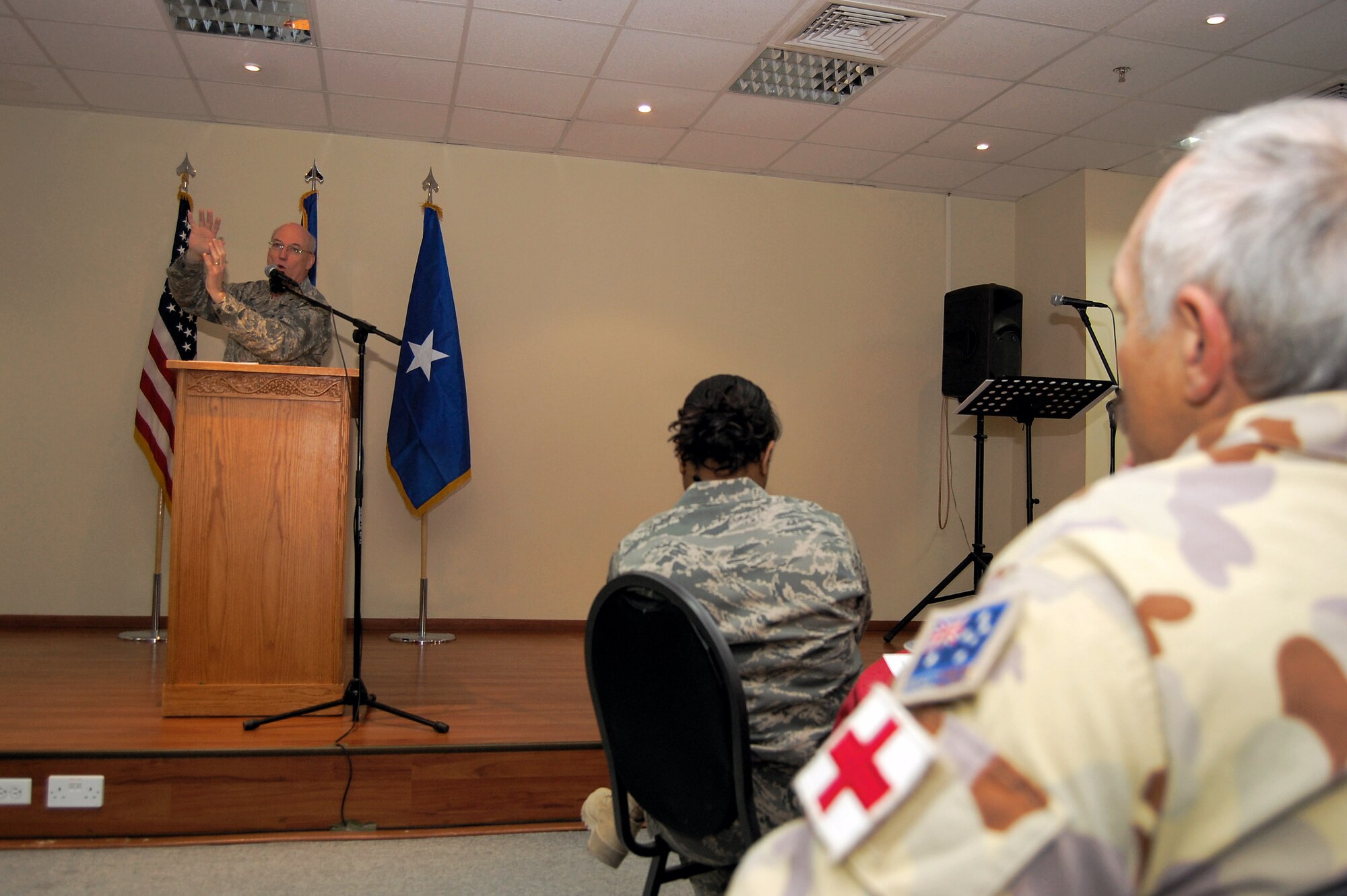 Chaplain (Brig. Gen.) Cecil R. Richardson speaks to more than 150 U.S. and coalition forces at the 386th Air Expeditionary Wing Chapel during the National Prayer Breakfast March 18 at a Southwest Asia air base. The Air Force deputy chief of chaplains was the guest speaker for the breakfast and took time to visit with Airmen at their work centers during a tour of the base. (U.S. Air Force photo/Tech. Sgt. Michael O'Connor) 

