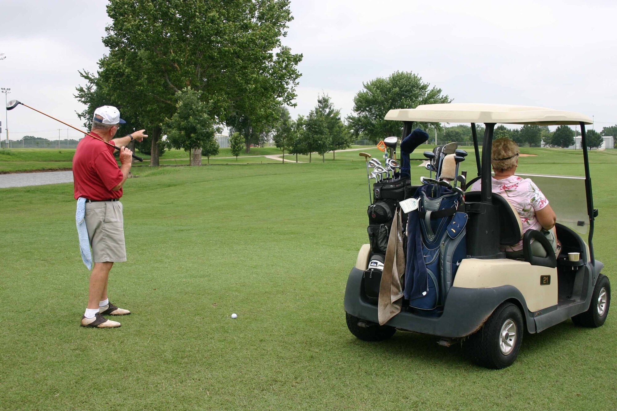 Donald Keith and Judy Coleman enjoy a day at the Tinker Golf Course.  The golf course is open from 6 a.m. to dusk daily, weather permitting.  (Air Force photo by Kimberly Woodruff)