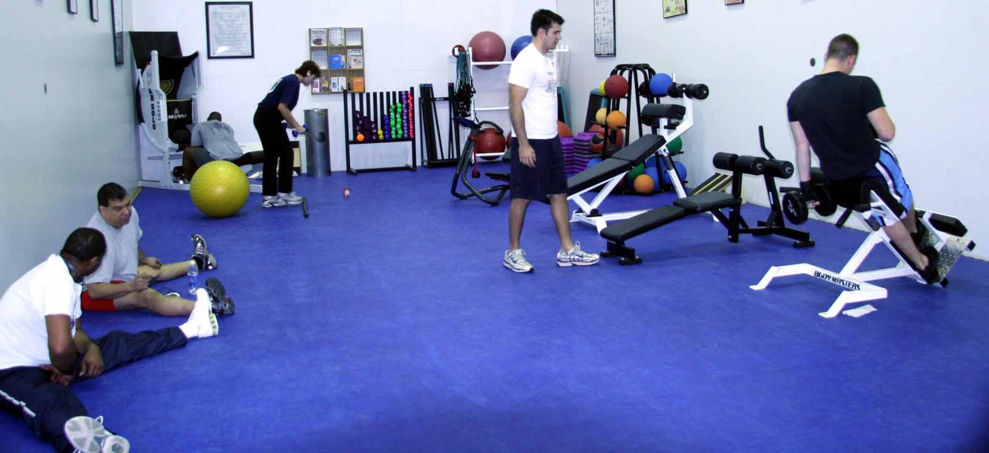 Team Tinker personnel work out in the Gerrity Fitness Center.  Becky Pilifant)