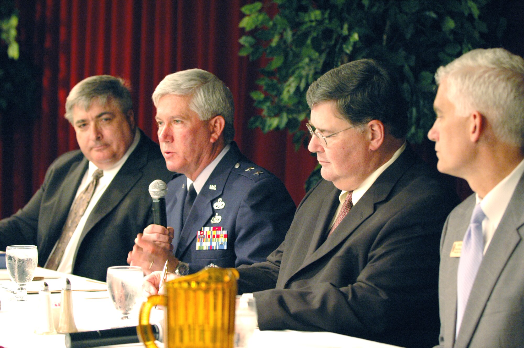 Garry Shafovaloff, Maj. Gen. Tom Owen, Tim Callahan, and John Cole sat on a panel to discuss and answer questions about base and community initiatives to replenish the workforce in the years ahead at Robins. Patsy Reeves was the moderator for the panel.U. S. Air Force photo by Sue Sapp