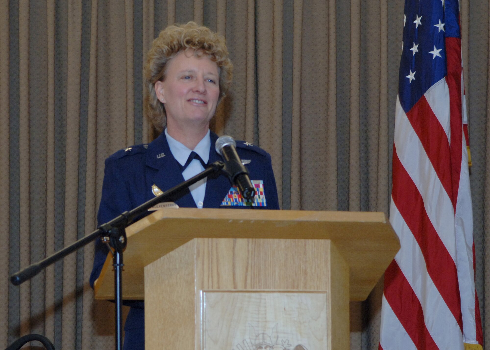 Brig. Gen. Barbara Faulkenberry, Deputy Director of Strategic Plans, Requirements and Programs, Headquarters Air Mobility Command, Scott Air Force Base, speaks to the members of Grand Forks Air Force Base, during the annual women?s heritage luncheon March 18 at the Northern Lights Club. General Faulkenberry talked about women in the past, the obstacles they have faced and about seizing the day. (U.S. Air Force photo by Senior Airman Tiffany Colburn)


