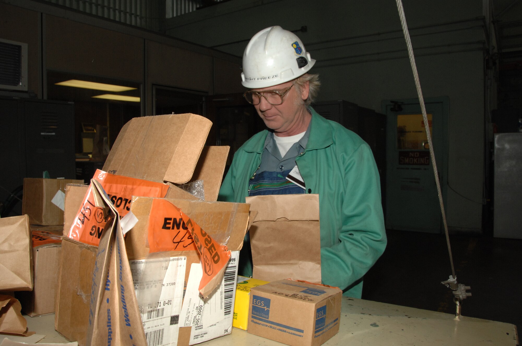 Aerospace Testing Alliance Pipefitter Dwight Freeze has been at Arnold Engineernig Development Center  since March 1979. A native of Greenwood, Ind., Freeze inventories material for the pipe shop. (Photo by David Housch)