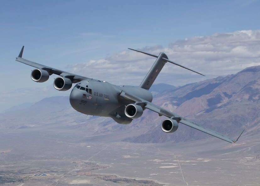 The C-17 Globemaster III T-1, shown here during a test mission in October 2007, completed its 1,000th flight March 10 while conducting tests on a hybrid air delivery system. T-1 is the first Air Force C-17 built to perform developmental testing. (Air Force photo)