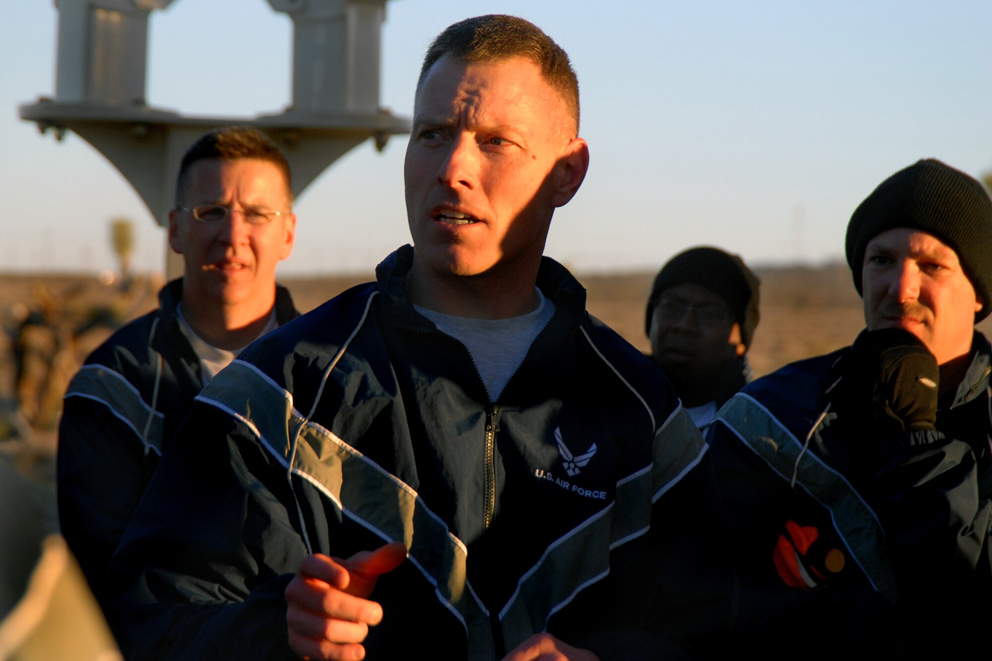 Chief Master Sgt. William Gurney, Air Force Materiel Command command chief, speaks during Edwards' senior noncommissioned officers group physical training session at the Rosburg Fitness Center here March 18. (Air Force Photo by Master Sgt. Eric M. Grill)