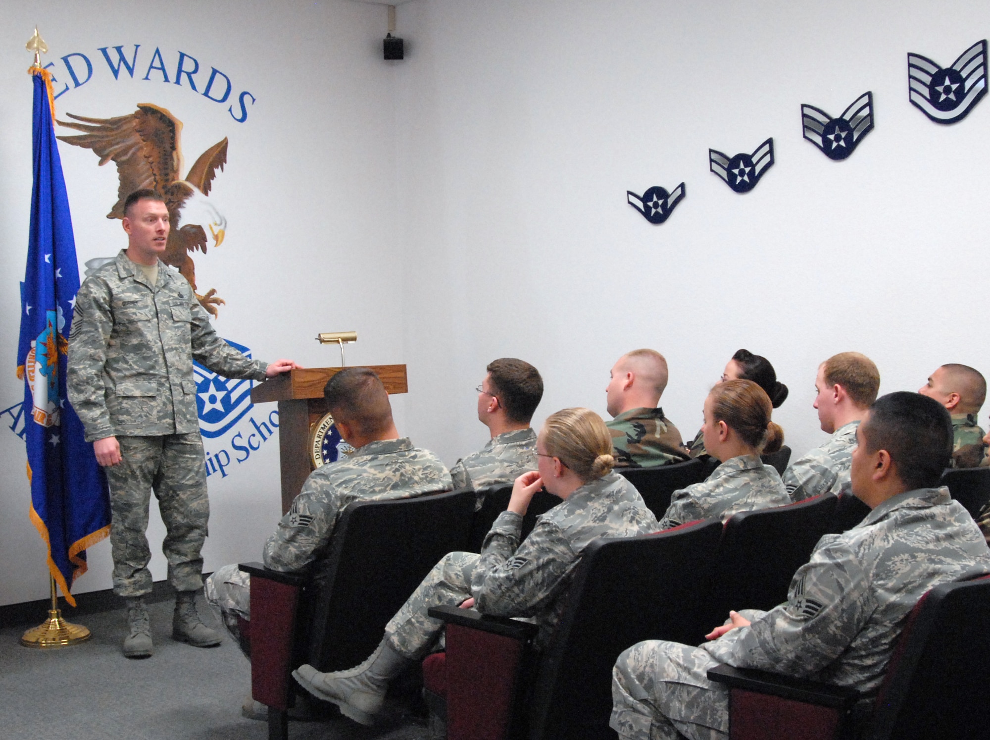 Chief Master Sgt. William Gurney, Air Force Materiel Command command chief, speaks to Edwards Airman Leadership School students about the important role they play in the Air Force’s mission to fly, fight and win. Chief Gurney visited Edwards March 17 and 18 to observe the base's mission. (Air Force photo by Senior Airman Stacy Sanchez) 