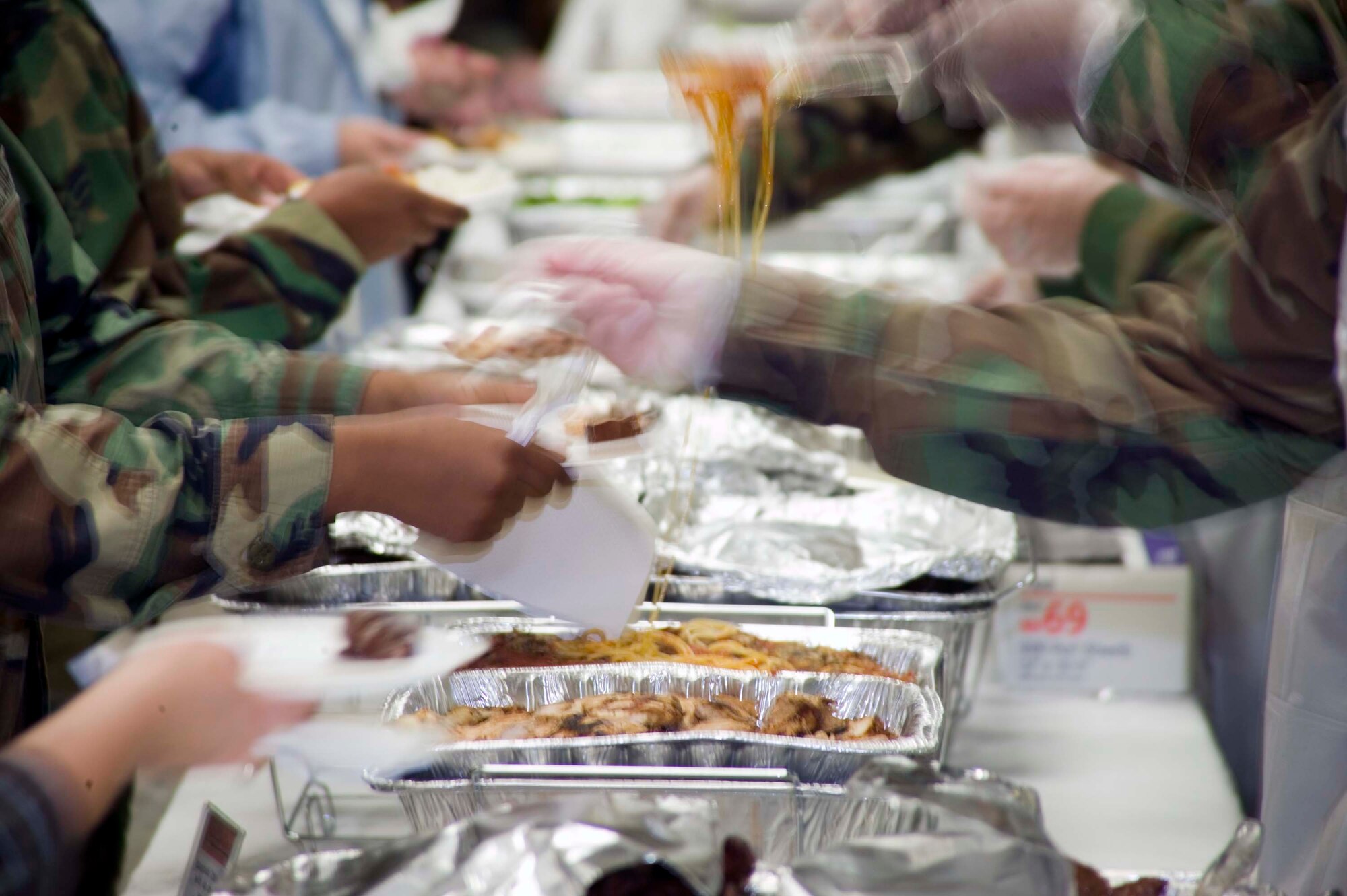 SHAW AIR FORCE BASE, S.C. -- Shaw members enjoy a free lunch March 19 during the Healthy Choice Sampler Event held at the community center social room. The variety of nutritious entrees were donated by 12 local community restaurants. The event was hosted by the Health and Wellness center to celebrate national nutrition month. (U.S. Air Force photo/Staff Sgt. John Gordinier)
