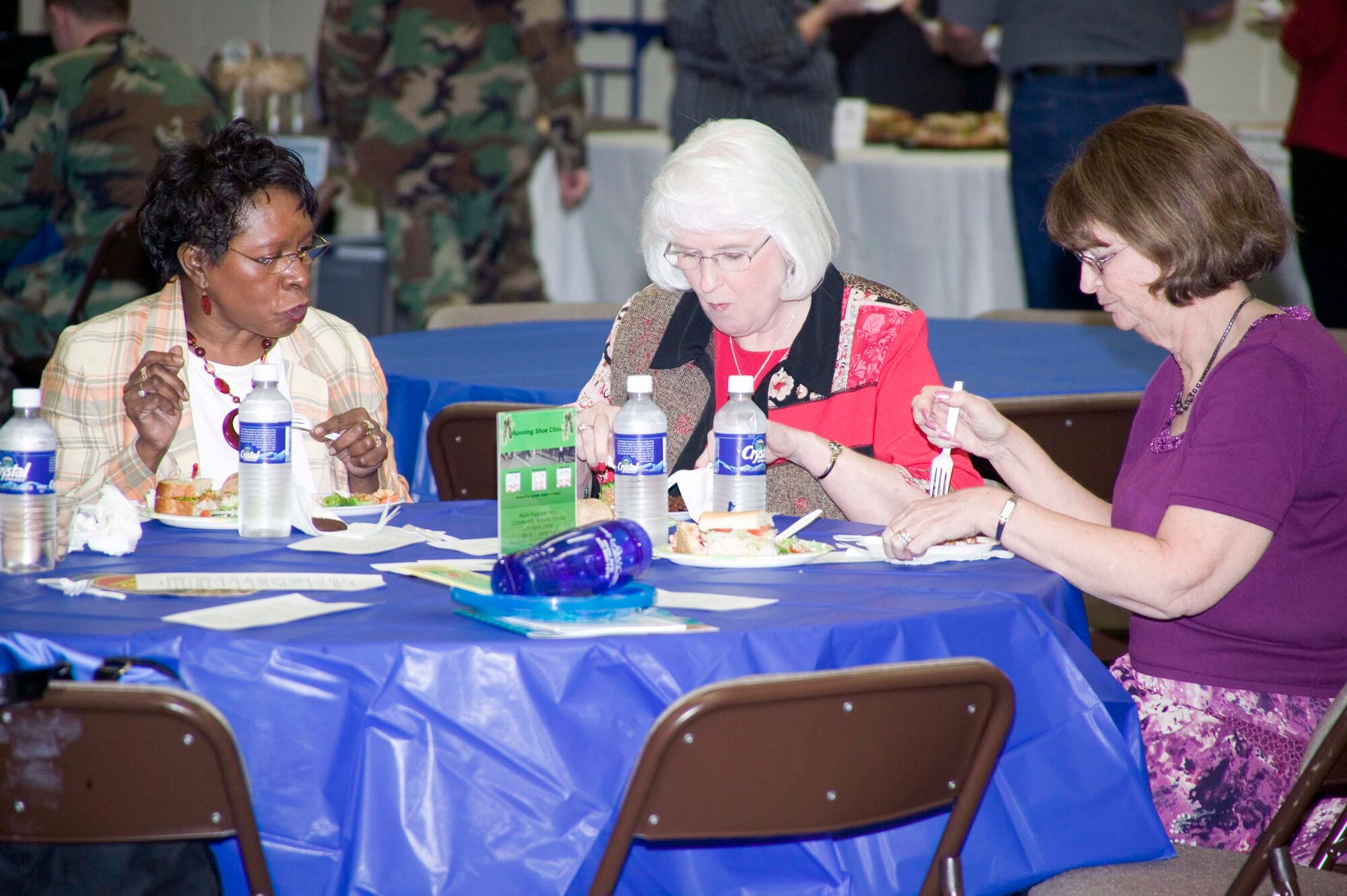 SHAW AIR FORCE BASE, S.C. -- Three Shaw members enjoy a free lunch March 19 during the Healthy Choice Sampler Event held at the community center social room. The variety of nutritious entrees were donated by 12 local community restaurants. The event was hosted by the Health and Wellness center to celebrate national nutrition month. (U.S. Air Force photo/Staff Sgt. John Gordinier)
