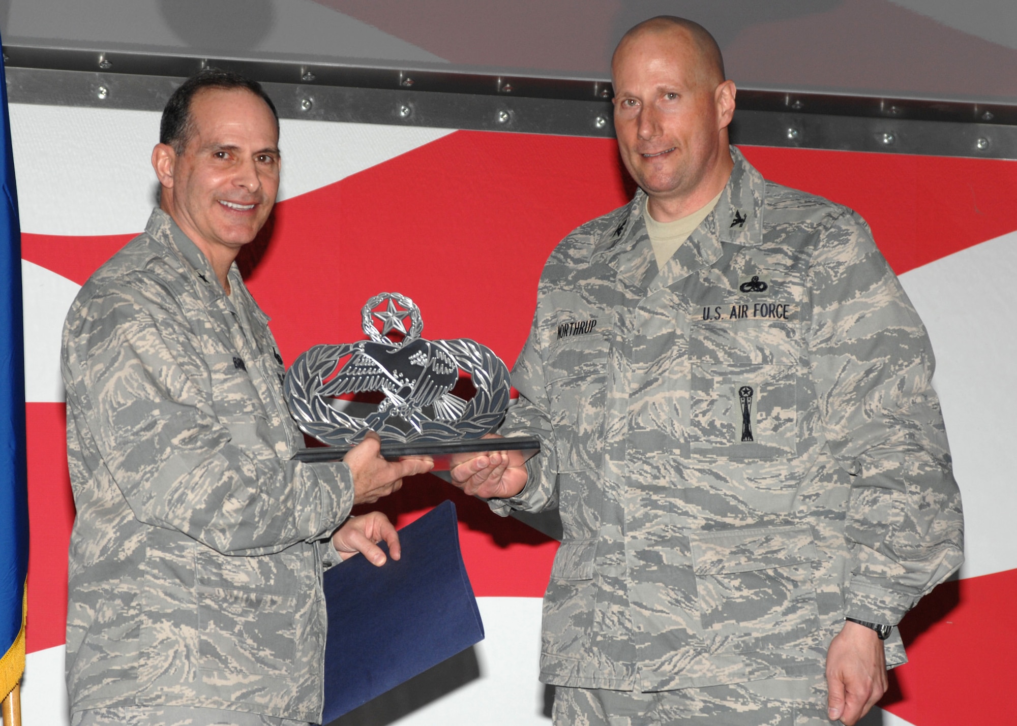 Colonel Alan Northrup, Commander of the 4th Maintenance Group, presents an award to Brigadier General Frank Bruno, Director of Logistics; Headquarters Air Force Materiel Command at Seymour Johnson AFB, North Carolina on March 14, 2008.  Brigadier General Bruno was the guest speaker at the Maintenance Professional of the Year banquet.  

(US Air Force photo by Airman First Class Salma Din)(Released)