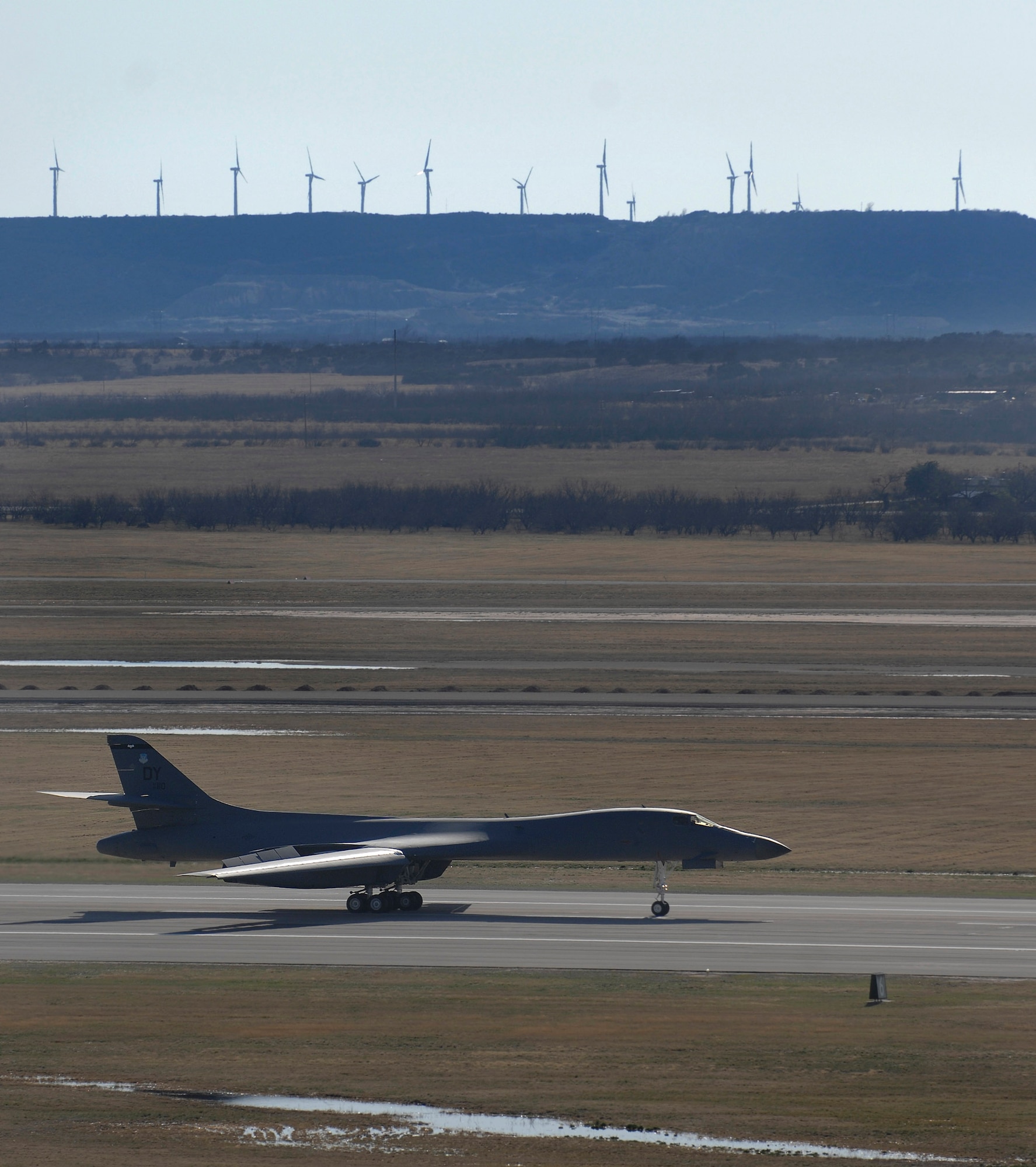 A B-1B Lancer taxies on the flightline after becoming the Air Force's first aircraft to fly at the supersonic speed using a 50/50 blend of synthetic and petroleum fuel March 19 at Dyess Air Force Base, Texas. The supersonic flight occured over the White Sands Missile Range airspace in south-central New Mexico, but took off from Dyess AFB. (U.S. Air Force photo/Airman 1st Class Jennifer Romig) 