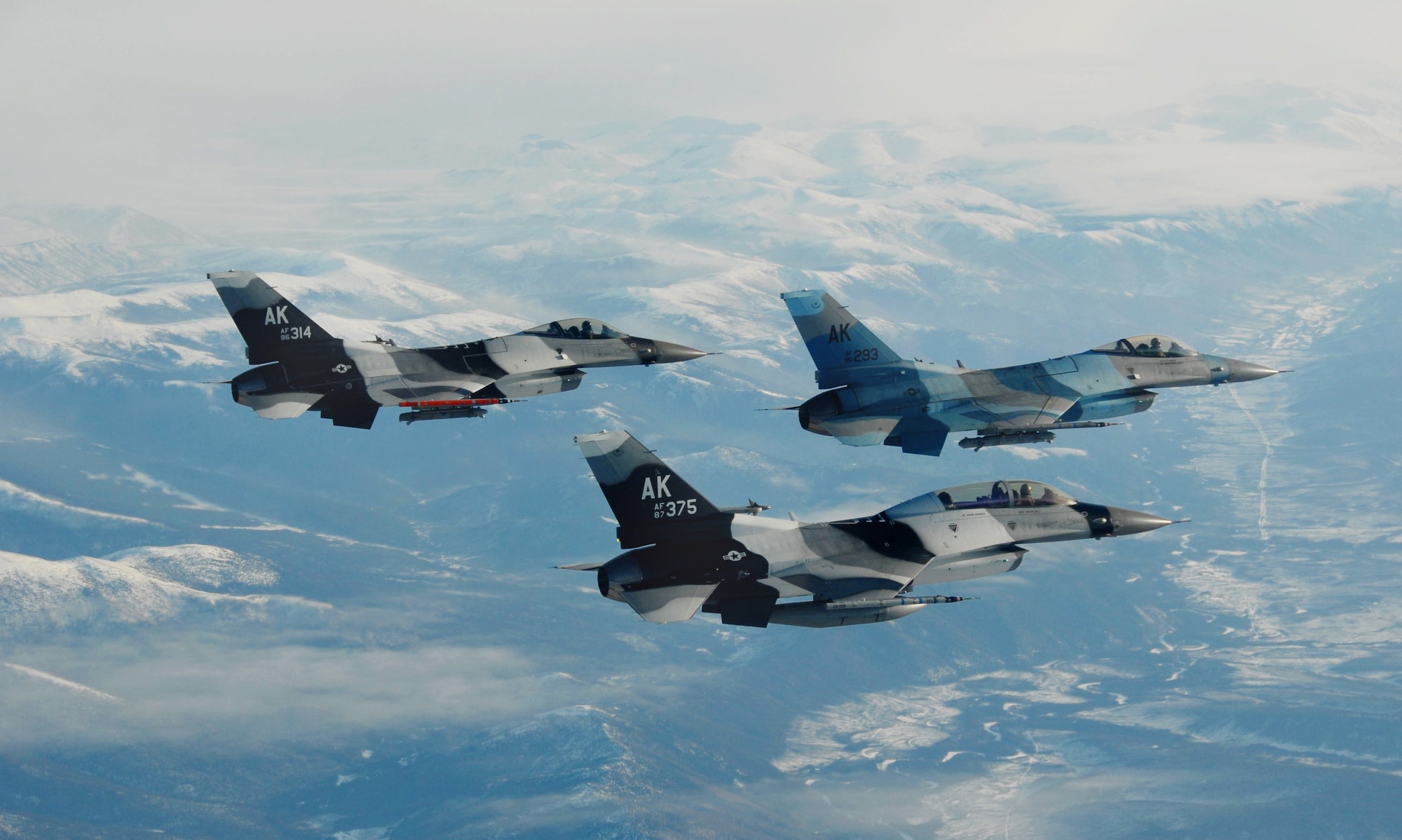 Three F-16 Fighting Falcon from the 18th Aggressor Squadron assigned to Eielson Air Force Base fly together in formation over parts of the Pacific Alaska Range Complex prior to a combat training mission March 20, 2008 in preparation for the first Red Flag-Alaska exercise.  This training exercise allows the pilots to practice in flight fighting and maneuvering capabilities that will be used against the participants in the Red Flag-Alaska exercise to simulate the capabilities of enemy aircraft.

(U.S Air Force Photo by Staff Sgt. Eric T. Sheler)

