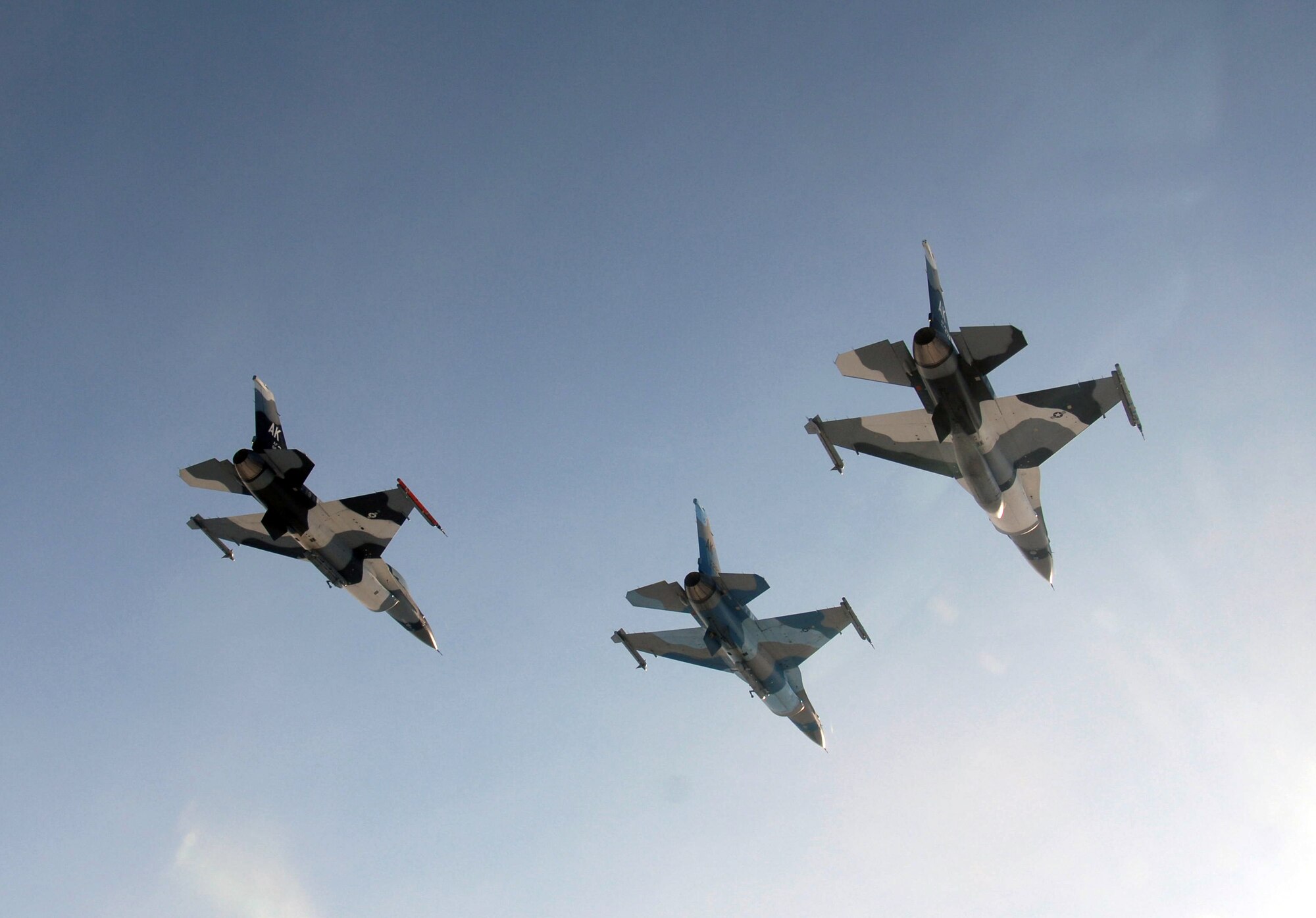 Three F-16 Fighting Falcon from the 18th Aggressor Squadron assigned to Eielson Air Force Base fly together in formation over parts of the Pacific Alaska Range Complex prior to a combat training mission March 20, 2008 in preparation for the first Red Flag-Alaska exercise.  This training exercise allows the pilots to practice in flight fighting and maneuvering capabilities that will be used against the participants in the Red Flag-Alaska exercise to simulate the capabilities of enemy aircraft.

(U.S Air Force Photo by Staff Sgt. Eric T. Sheler)

