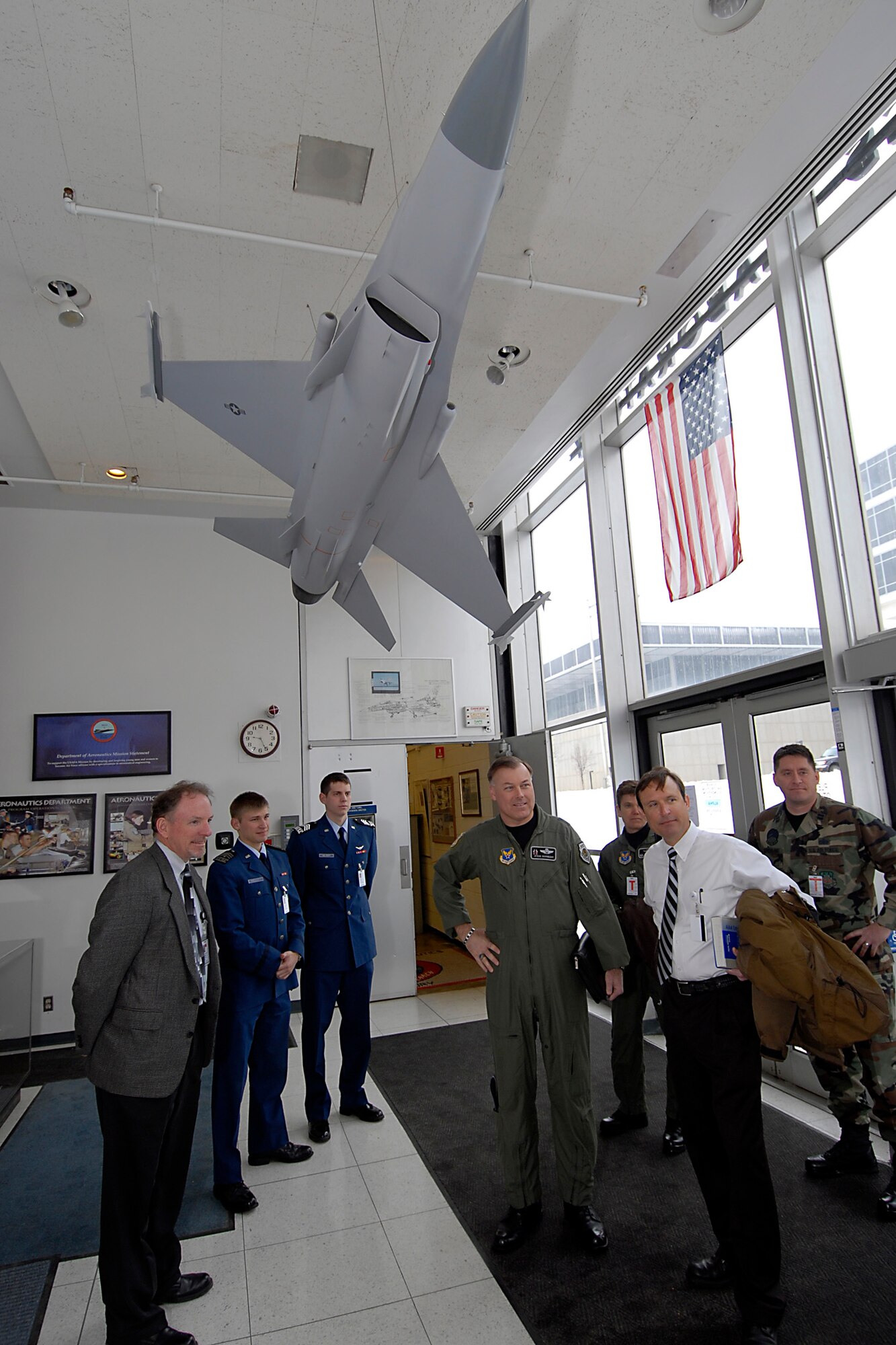 (Middle) Maj. Gen. Stephen T. Sargeant, Air Force Operational Test and Evaluation Center Commander, is greeted by U.S. Air Force Academy faculty members and cadets during a March 17, 2008 visit that included the formal signing of a memorandum of agreement between AFOTEC and the USAFA creating a comprehensive mentoring program to assist Academy cadets during their academic and professional development.