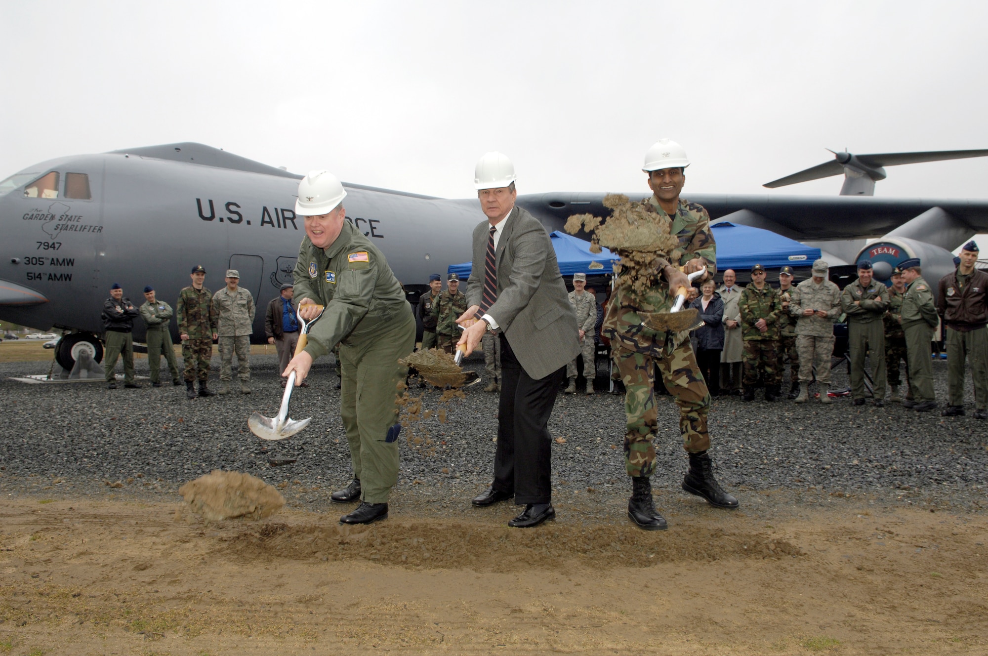 Col. James Kerr, 514th Air Mobility Wing commander, Ted Strempack, Thomas B. McGuire Foundation president, and Col. Balan Ayyar, 305th AMW and installation commander, shovel the first dirt during a ground breaking ceremony for McGuire AFB’s C-141 Starlifter Memorial Park.  The C-141 was the backbone of Air Mobility Command and its predecessor, Military Airlift Command, and it traveled the globe for nearly 41 years delivering cargo, troops and hope during peacetime and war.  This memorial, which displays the flagship of McGuire Air Force Base’s original fleet, will honor the lives lost and the mission excellence demonstrated by McGuire Airmen who flew, maintained and supported this historic aircraft.  The aircraft on display at McGuire, was named “The Garden State Airlifter” in recognition of the state’s contribution to the Air Force mission.  In August 1967, it was the first C-141 to be delivered to McGuire. (U.S. Air Force photo by Kenn Mann) 