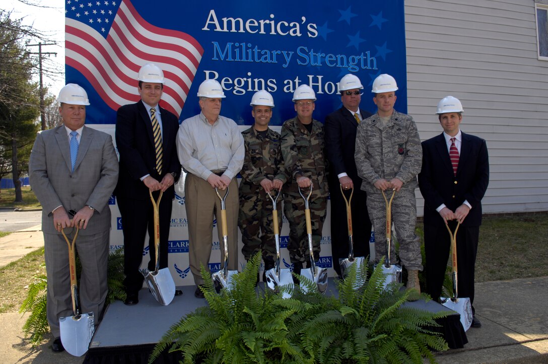 Col Eric Snadecki, 316th Wing vice Commander, and members of Clark Realty pose during a ground breaking ceremony on Mar 14. The ground breaking ceremony was for the part of base housing that is being renovated. The project is going to take approximately 1.5 years and will include the construction of 134 new homes to include three and four bedrooms for the enlisted personnel living on base.  (US Air Force/SrA Renae Kleckner)