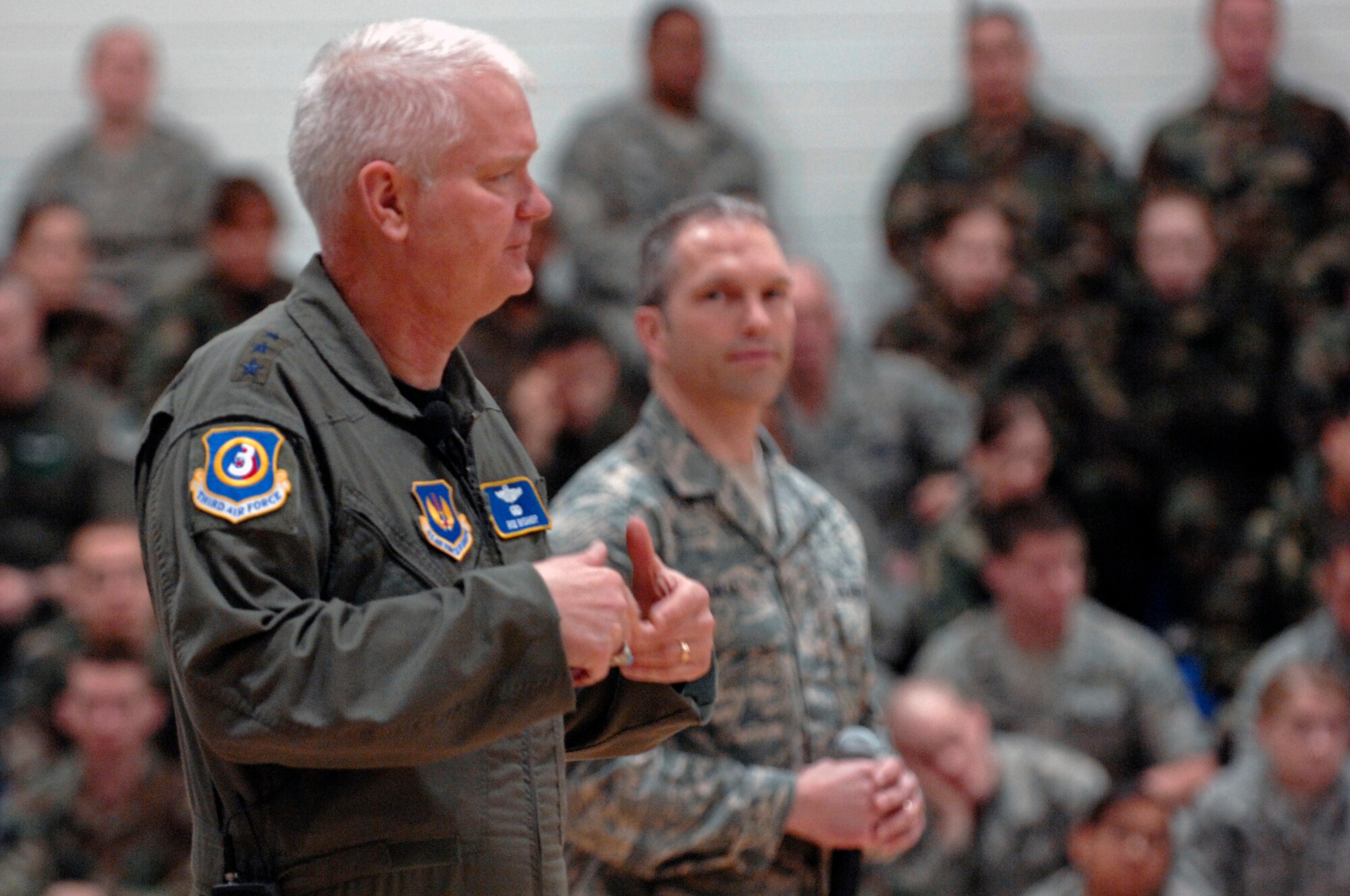 Lt. Gen. Robert D. Bishop Jr., 3rd Air Force commander, and Chief Master Sgt. Martin Klukas, 3rd Air Force command chief master sergeant, held an Airmen’s call at RAF Lakenheath, England March 19. The Airmen’s call emphasized Airmen’s spiritual fitness and saving money. (U.S. Air Force photo by Airman 1st Class Erika Brooke)