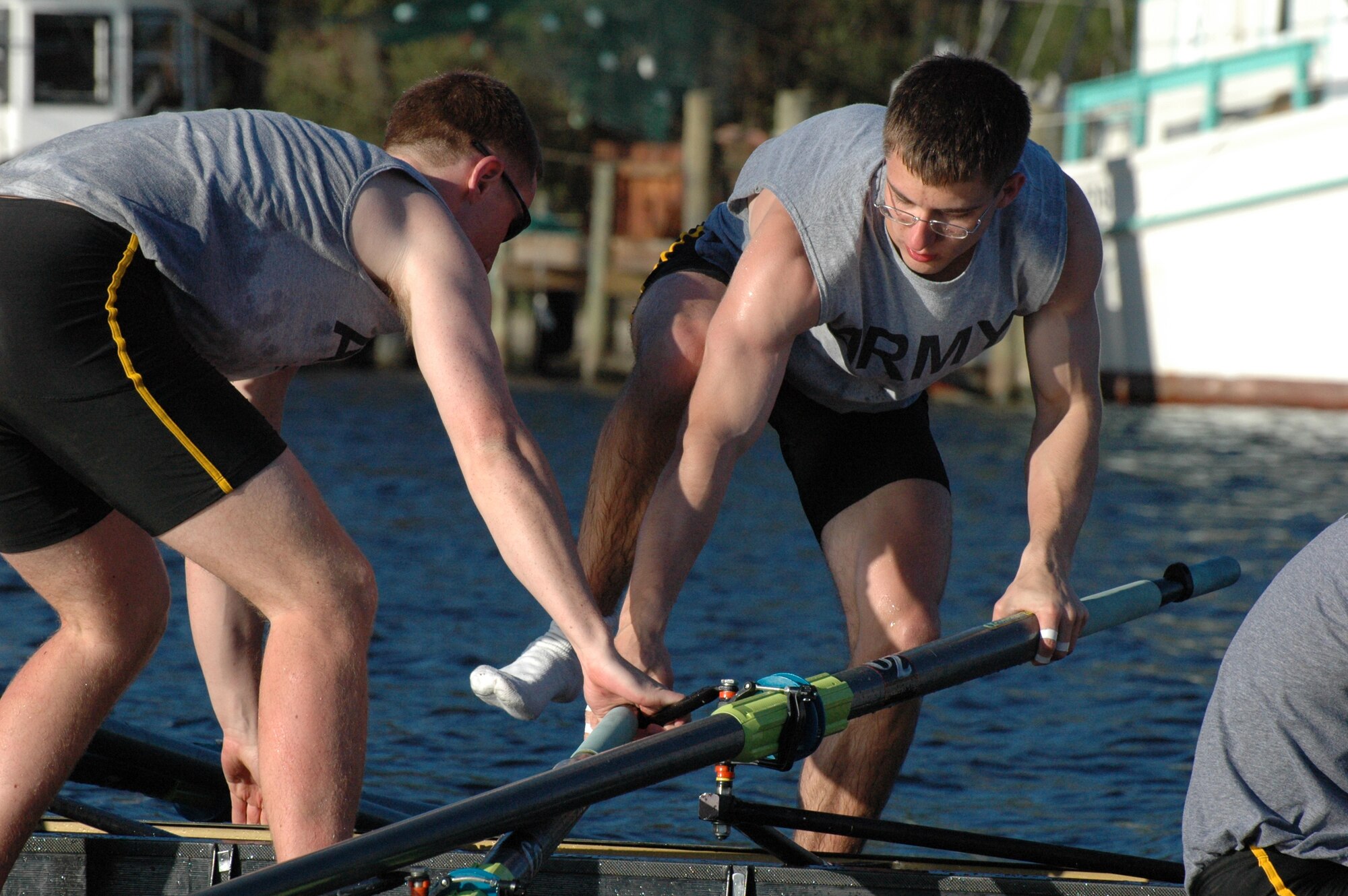 EGLIN AIR FORCE BASE, Fla. -- The United States Military Academy at West Point crew team switch boats mid-water to see who is the better teammate for the varsity boat. The teammates are vying against each other for a spot on the varsity crew team. Started in 1985, the crew team has been coming to Eglin for three years for spring break to practice their technique, speed and teamwork. (U.S. Air Force photo/ Staff Sgt. Stacia Zachary)