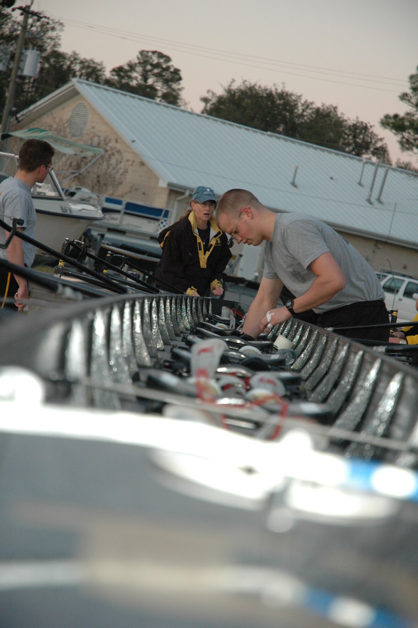 EGLIN AIR FORCE BASE, Fla. -- The United States Military Academy at West Point cadet Plebe Tom Mussman ensures the equipment is ready for use prior to launching the skull into the Boggy Bayou. Started in 1985, the crew team has been coming to Eglin for three years for spring break to practice their technique, speed and teamwork. (U.S. Air Force photo/ Staff Sgt. Stacia Zachary)