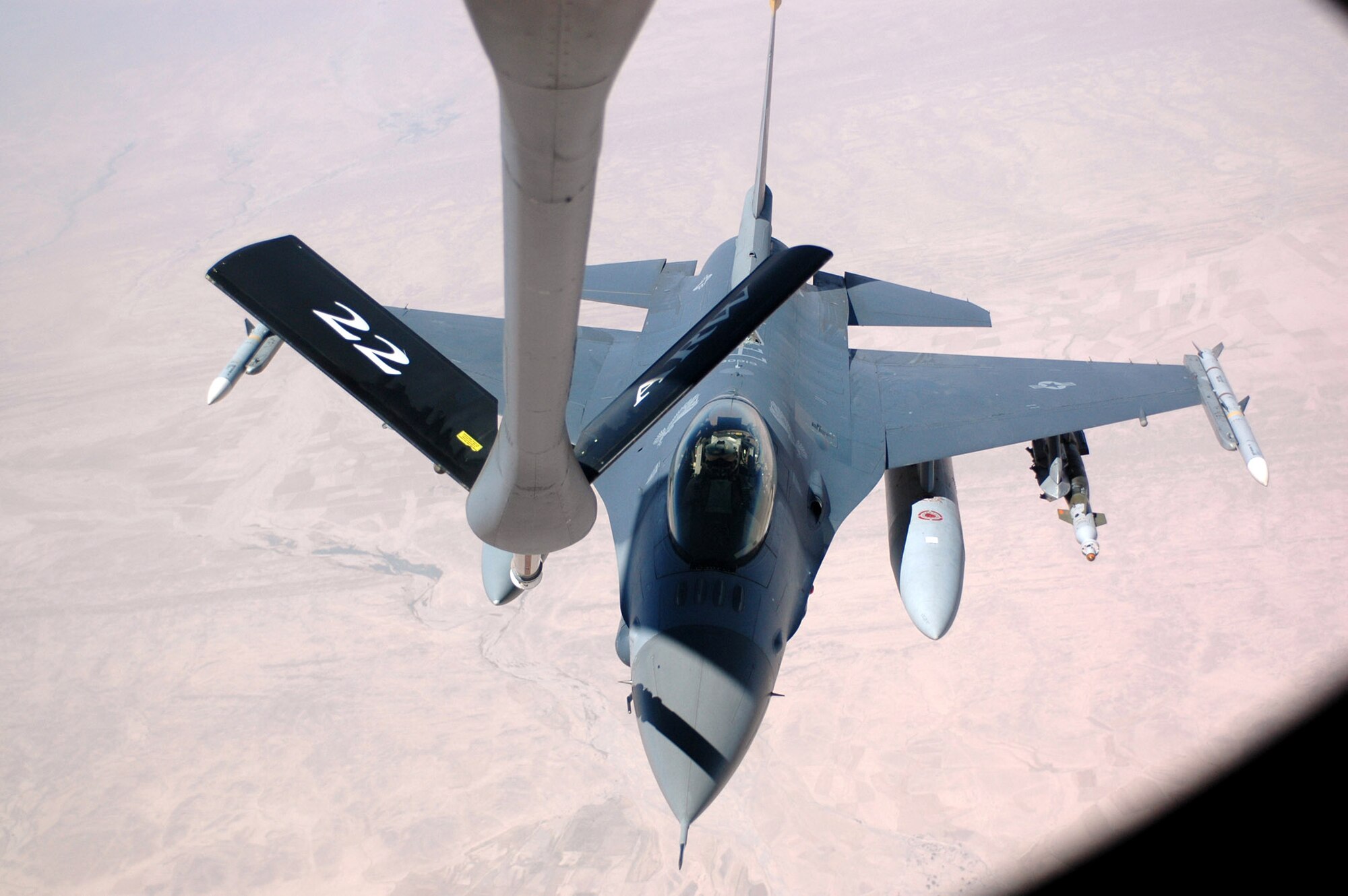 An F-16 Fighting Falcon gets fuel from a KC-135 Stratotanker. The fighter was providing close air support for ground forces in Iraq. Air Force officials hope to replace the nearly 50-year-old KC-135 Stratotanker as soon as possible. (U.S. Air Force photo/Senior Airman Clark Staehle)
