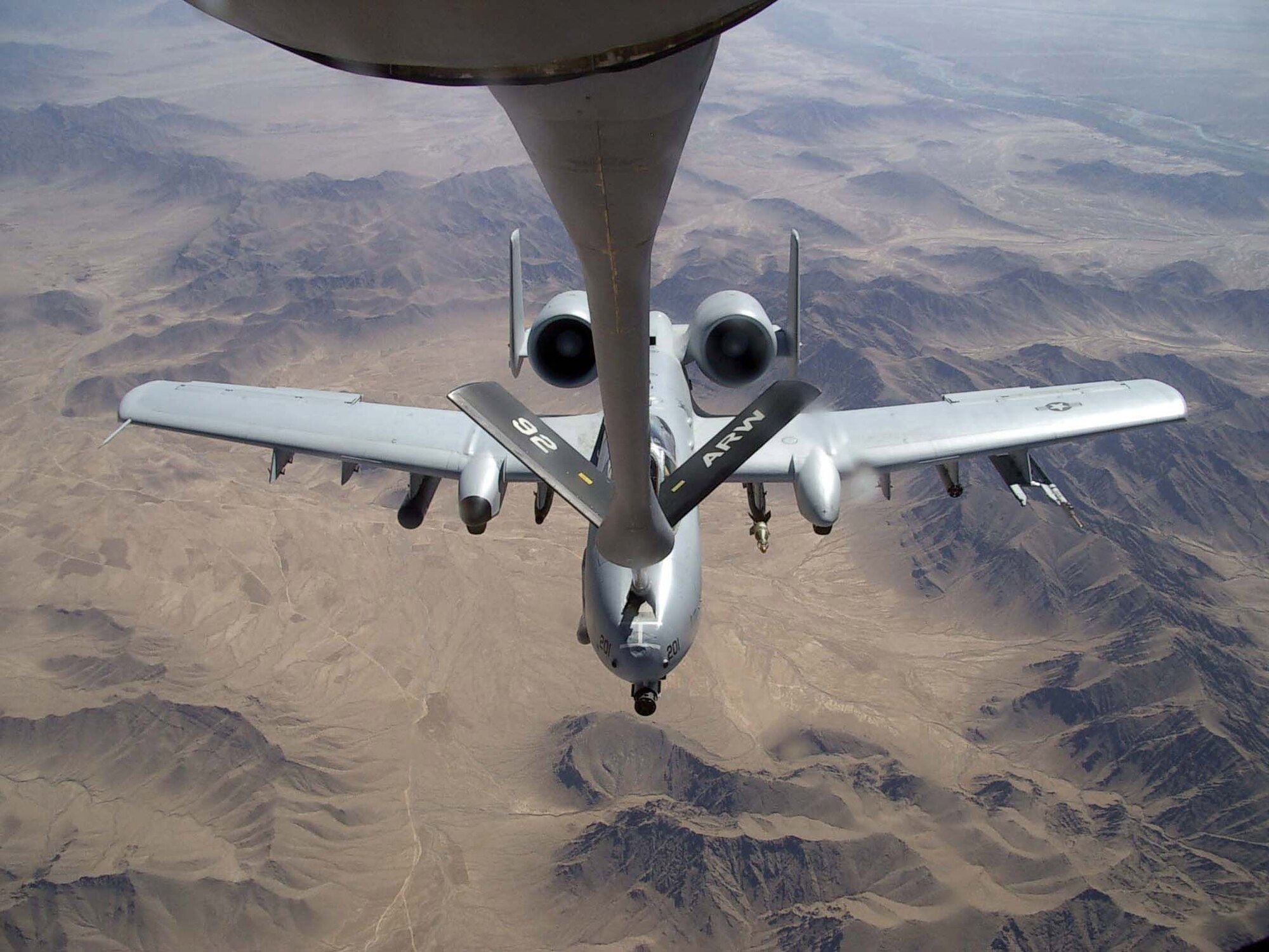 An A-10 Thunderbolt II takes on gas from a KC-135 Stratotanker over Afghanistan. The newer, more capable KC-45A aircraft will soon replace the aging KC-135 aircraft. (U.S. Air Force photo/Airman 1st Class Lonnie Mast)