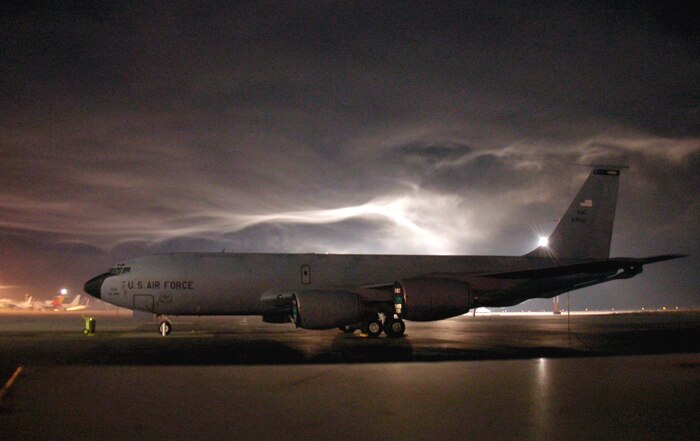 A KC-135 Stratotanker sits on the flightline at Manas Air Base, Kyrgyzstan, awaiting ground crews to de-ice the tanker before it takes off on a refueling mission. The new KC-45A will replace the aging fleet of KC-135s. (U.S. Air Force photo/Staff Sgt. Paul Clifford) 