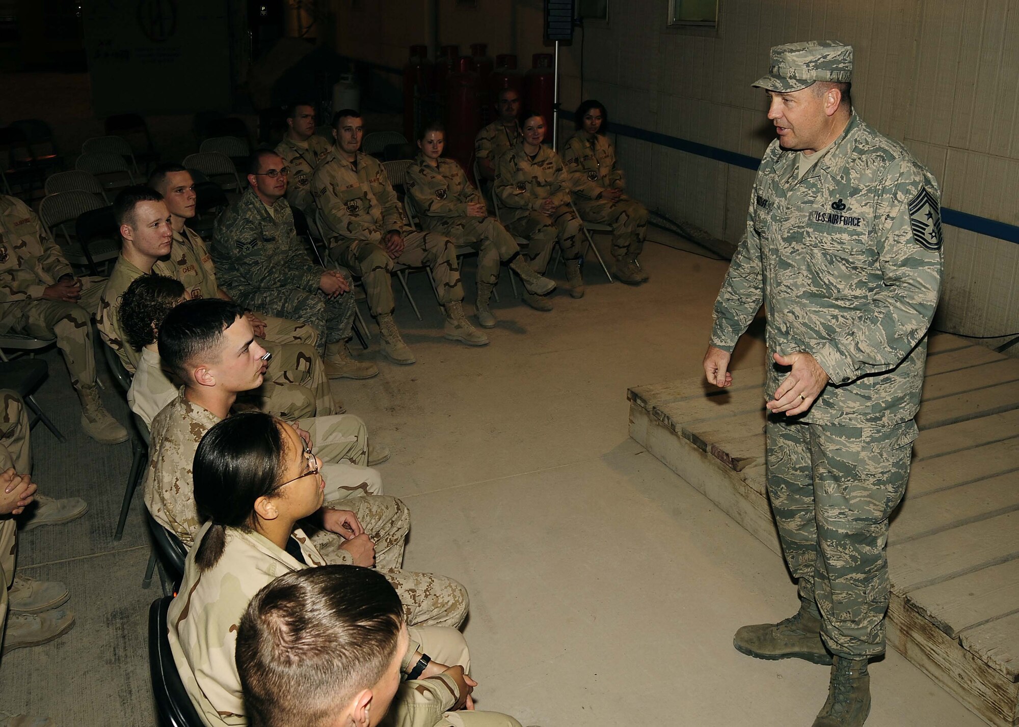 Chief Master Sgt. Scott Dearduff, U.S. Air Forces Central command chief master sergeant, visits Airmen at the Combined Air and Space Operations Center in Southwest Asia, March 11. Chief Dearduff assumed the position of USAFCENT command chief, Mar. 3. The chief emphasized the need to follow standards in today's Global War on Terror. (U.S. Air Force photo/Staff Sgt. Shawn J. Jones)