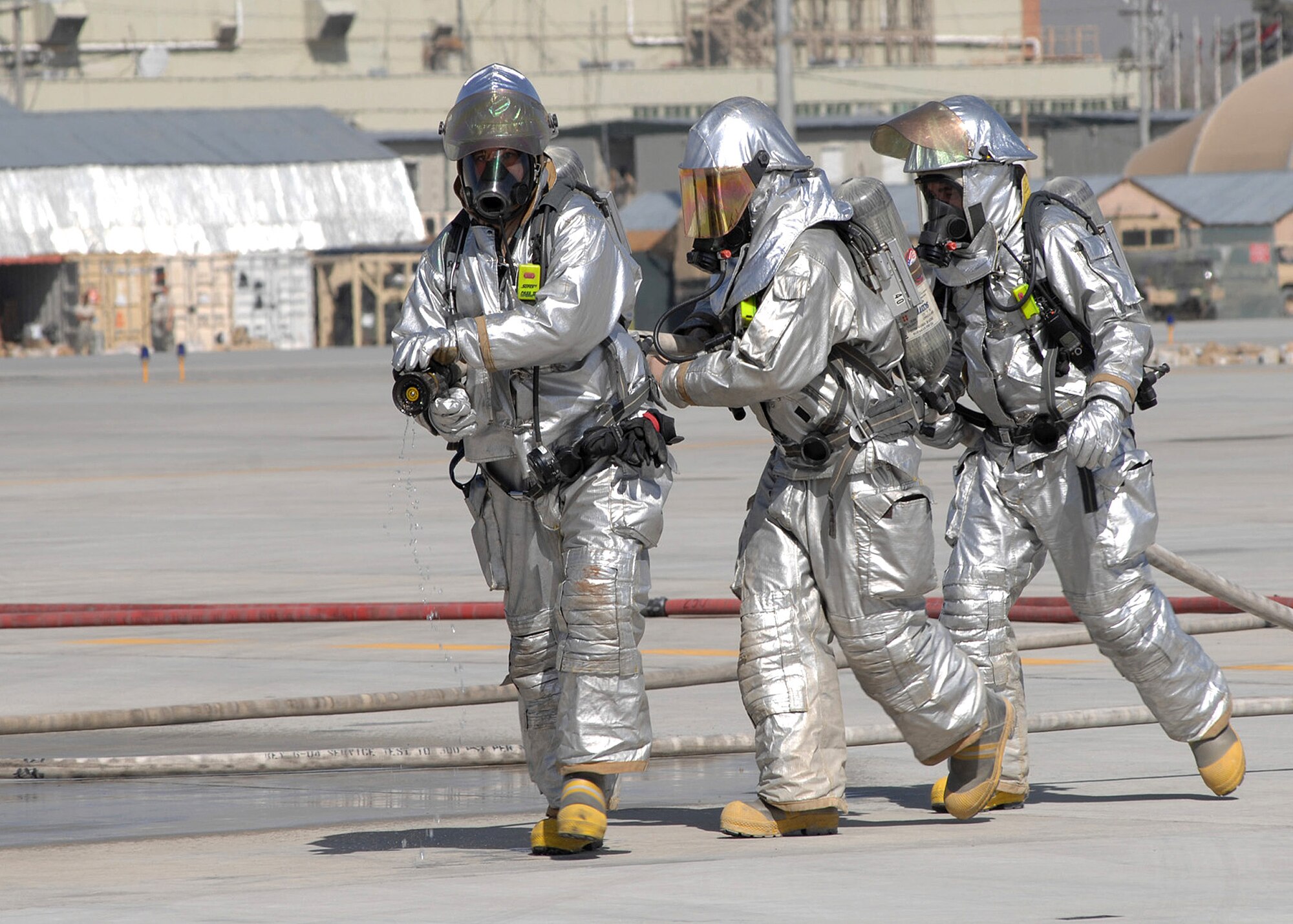 BAGRAM AIR BASE, Afghanistan -- Firefighters participate in a major accident response exercise here March 11.  The MARE was the 455th Air Expeditionary Wing’s first exercise to take place here.  (U.S. Air Force photo by Master Sgt. Demetrius Lester)