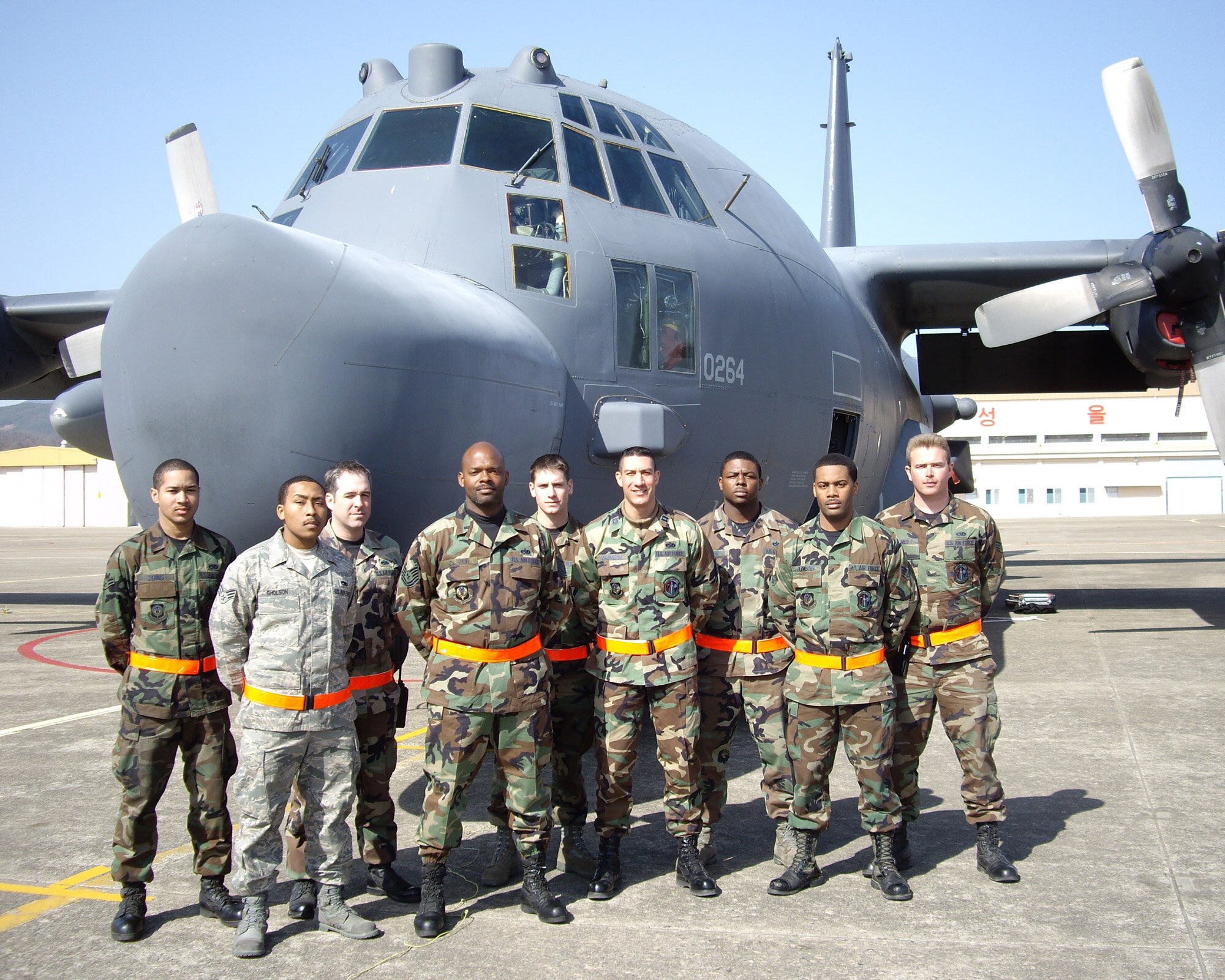 DAEGU AIR BASE, Republic of Korea -- Crew Chief Tech. Sgt. Troy Oliver (fourth from left) said "this is my team," as he proudly stands with members of his 353 Special Operations Group (SOG) as they complete Foal Eagle 2008 and return home to Kadana Air Base, Japan. This is Sergeant Oliver's fifth Foal Eagle Exercise.  (U.S. Air Force photo/Lt. Col. Rene White)