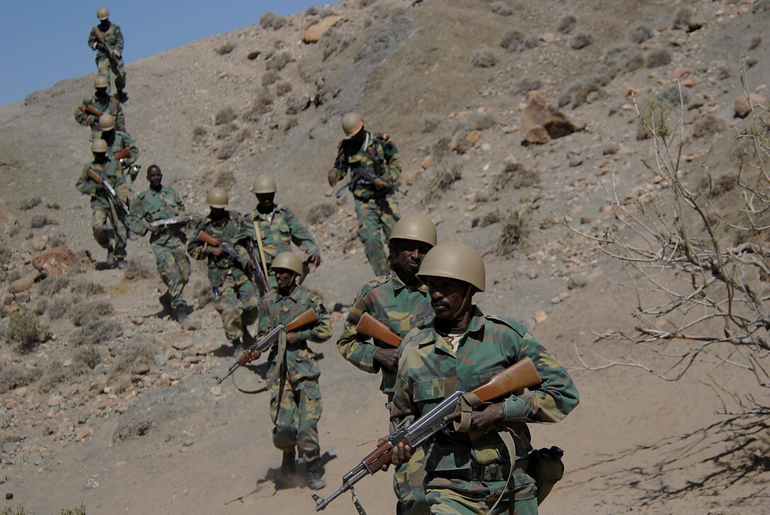 Djiboutian army soldiers head out on patrol during Operation Able Dart 08-01 on Forward Operating Location Ali Sabieh, Djibouti, March 4, 2008. 