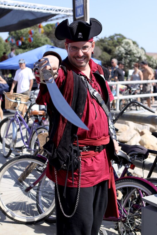 Carlo Mazzura, dressed as a pirate and claims his character is a brothel inspector, poses with his sword as he prepares to inspect the taverns of the harbor during the 29th annual Harbor Days at Oceanside Harbor, Sept. 19 and 20.