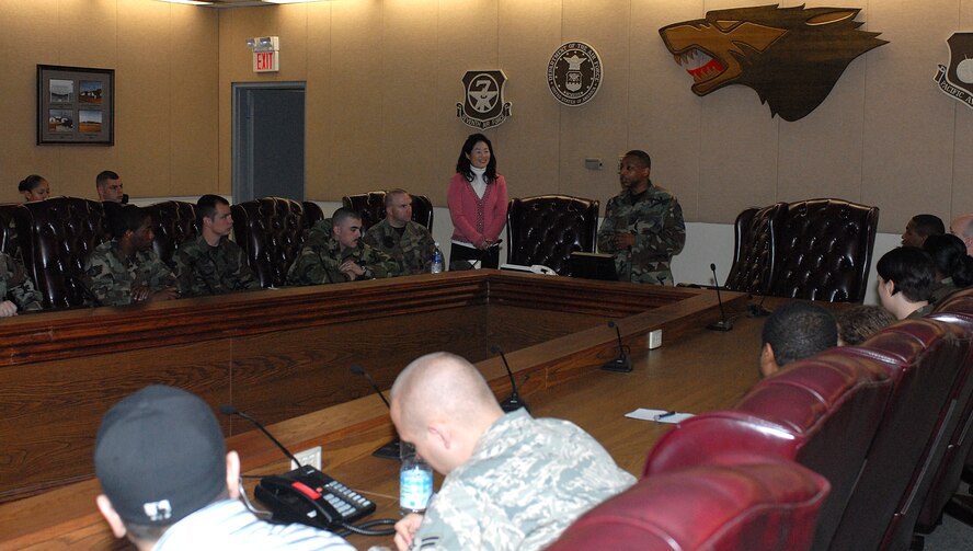 KUNSAN AIR BASE, Republic of Korea -- Chief Master Sgt. Anthony Brinkley, 8th Fighter Wing command chief, briefs Airmen about dress and appearance here March 25.  The volunteer system is a part of the good neighbor program, which provides Airmen opportunities such as teaching English at local schools and learning more about Korean culture. (U.S. Air Force photo/Senior Airman Giang Nguyen)