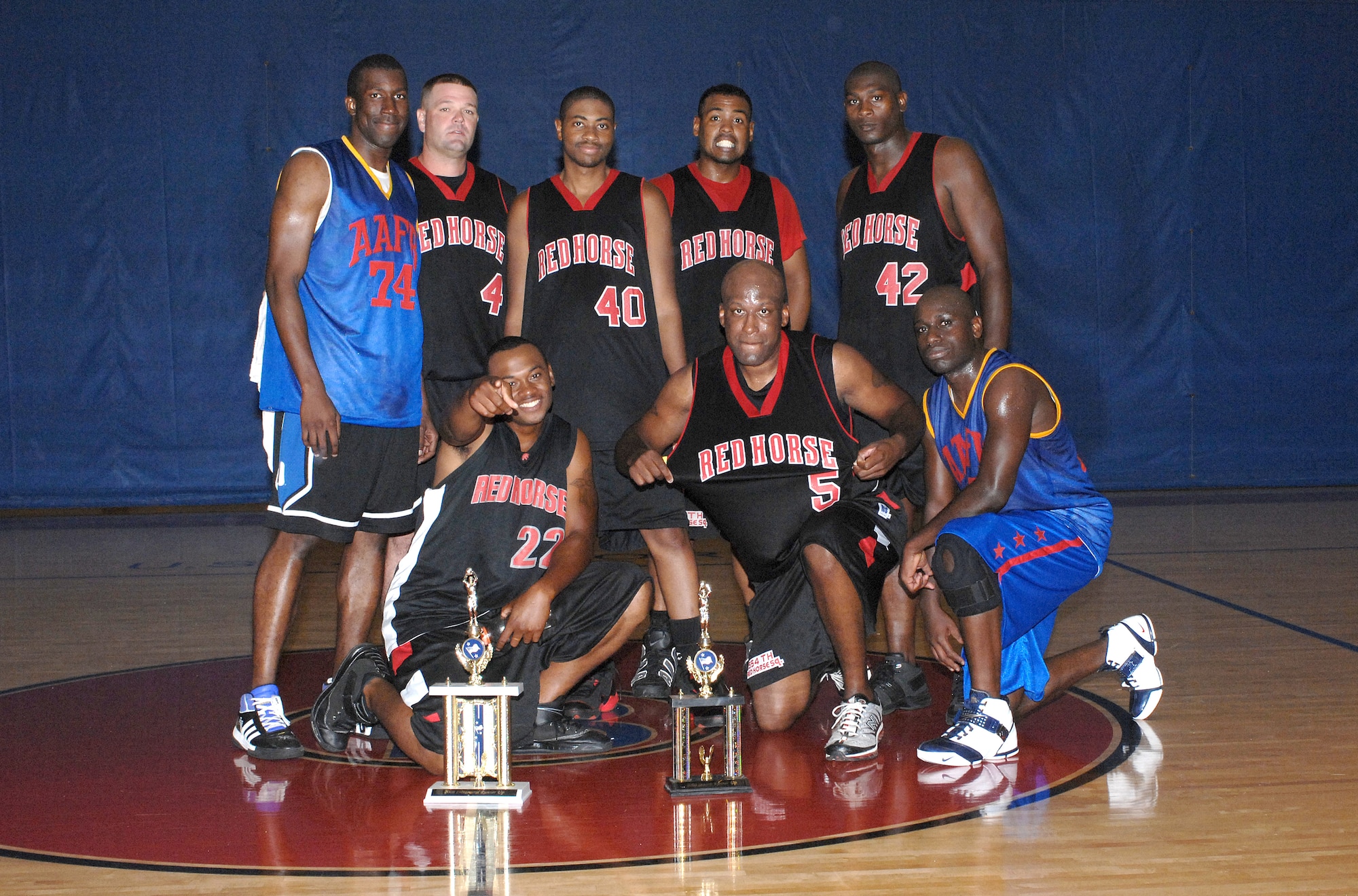 The 554th RED HORSE Squadron intramural basketball team poses after taking second place in the 2008 intramural basketball championships March 24.  (Photo by Senior Airman Miranda Moorer/36th Wing Public Affairs) 

          