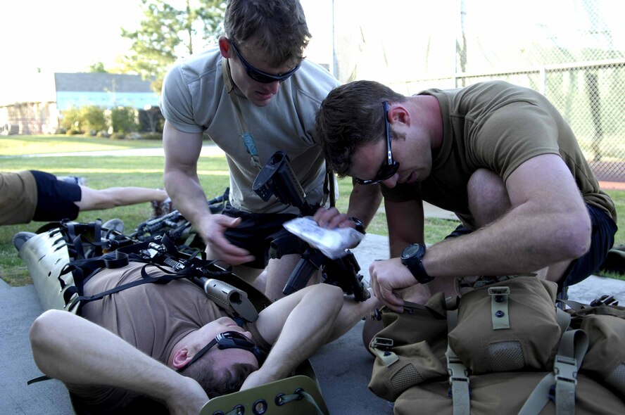MOODY AIR FORCE BASE, Ga. -- Members of the 38th Rescue Squadron compete in a medical exercise during the Inaugural Maltz/Plite Monster Mash competition here March 21. The Monster Mash honors two 38th RQS Pararescuemen killed in action in Afghanistan in March 2003. (U.S. Air Force photo by Senior Airman Elizabeth Rissmiller)
