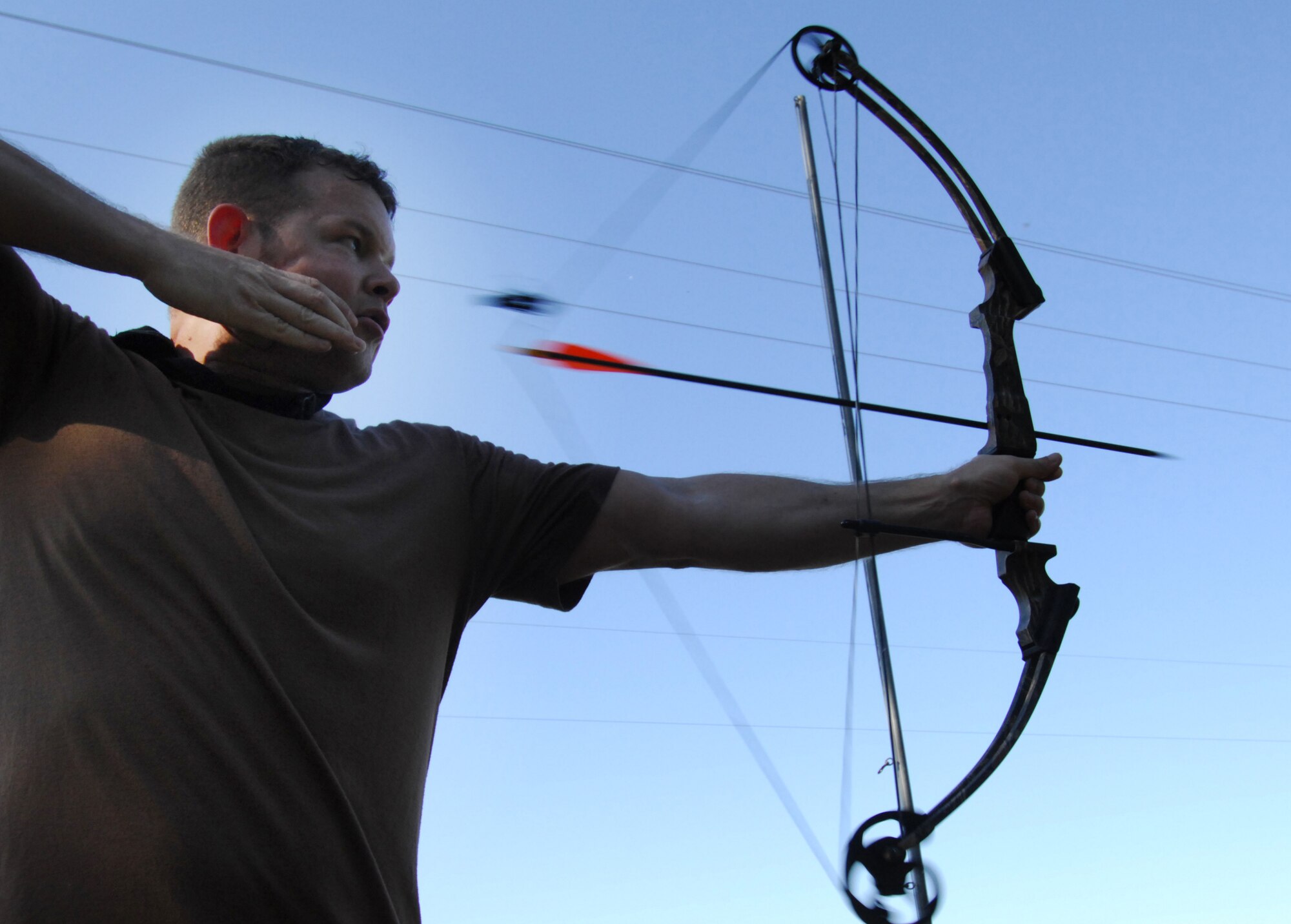 MOODY AIR FORCE BASE, Ga. -- Technical Sergeant Rob Disney, a pararescueman with the 38th Rescue Squadron here, shoots a bow during the Inaugural Maltz/Plite Monster Mash  21 March. The Monster Mash is a skills and endurance competition between 38th RQS members, and is dedicated to pay tribute to two pararescuemen from the 38th RQS killed in action March 23, 2003 in Afghanistan. (U.S. Air Force photo by Staff Sgt. Joshua T. Jasper)