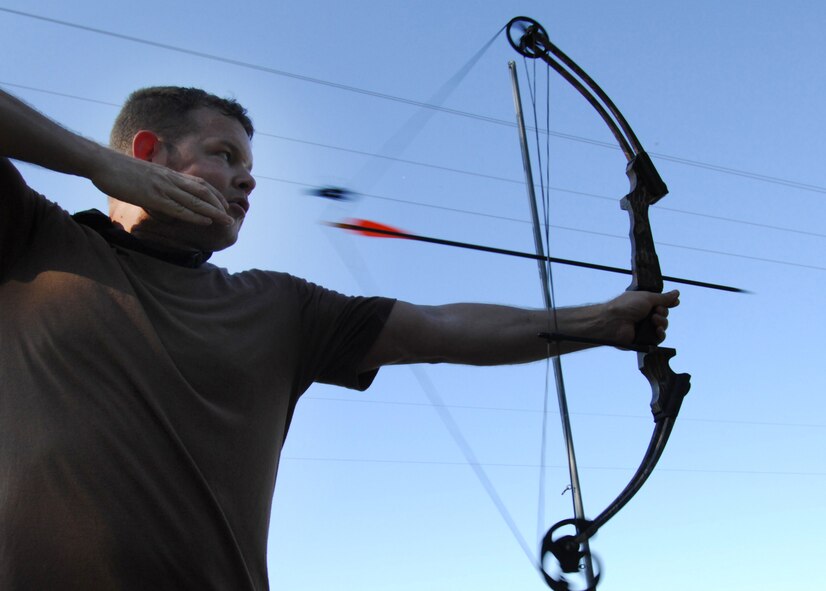 MOODY AIR FORCE BASE, Ga. -- Technical Sergeant Rob Disney, a pararescueman with the 38th Rescue Squadron here, shoots a bow during the Inaugural Maltz/Plite Monster Mash  21 March. The Monster Mash is a skills and endurance competition between 38th RQS members, and is dedicated to pay tribute to two pararescuemen from the 38th RQS killed in action March 23, 2003 in Afghanistan. (U.S. Air Force photo by Staff Sgt. Joshua T. Jasper)
