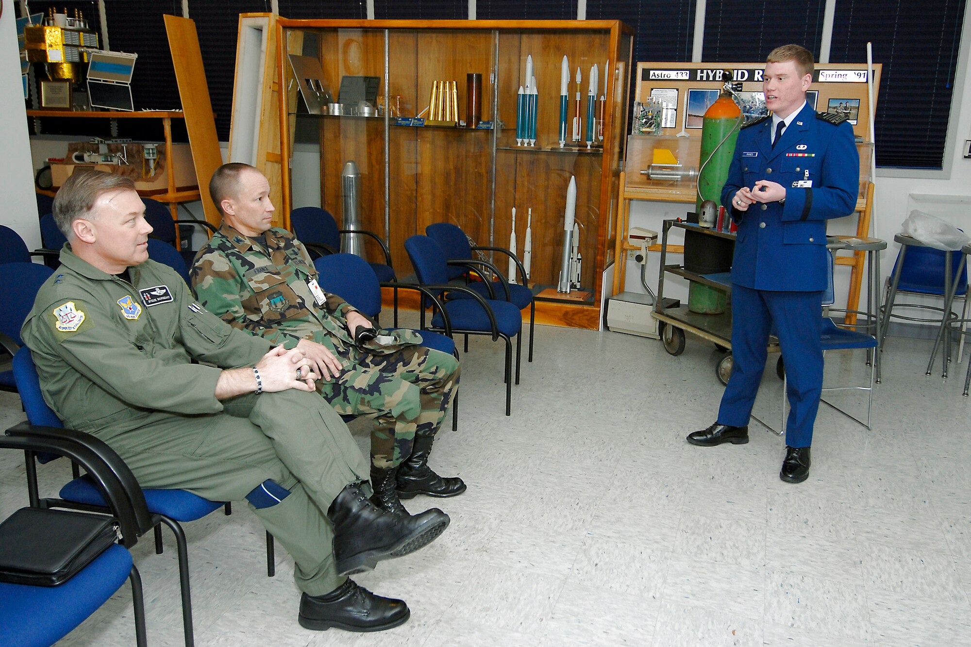 Maj. Gen. Stephen T. Sargeant (left) listens to a U.S. Air Force Academy cadet during a cadet capstone team briefing March 17 at the Academy in Colorado Springs, Colo. General Sargeant is the Air Force Operational Test and Evaluation Center commander from Kirtland Air Force Base, N.M. (U.S. Air Force photo) 
