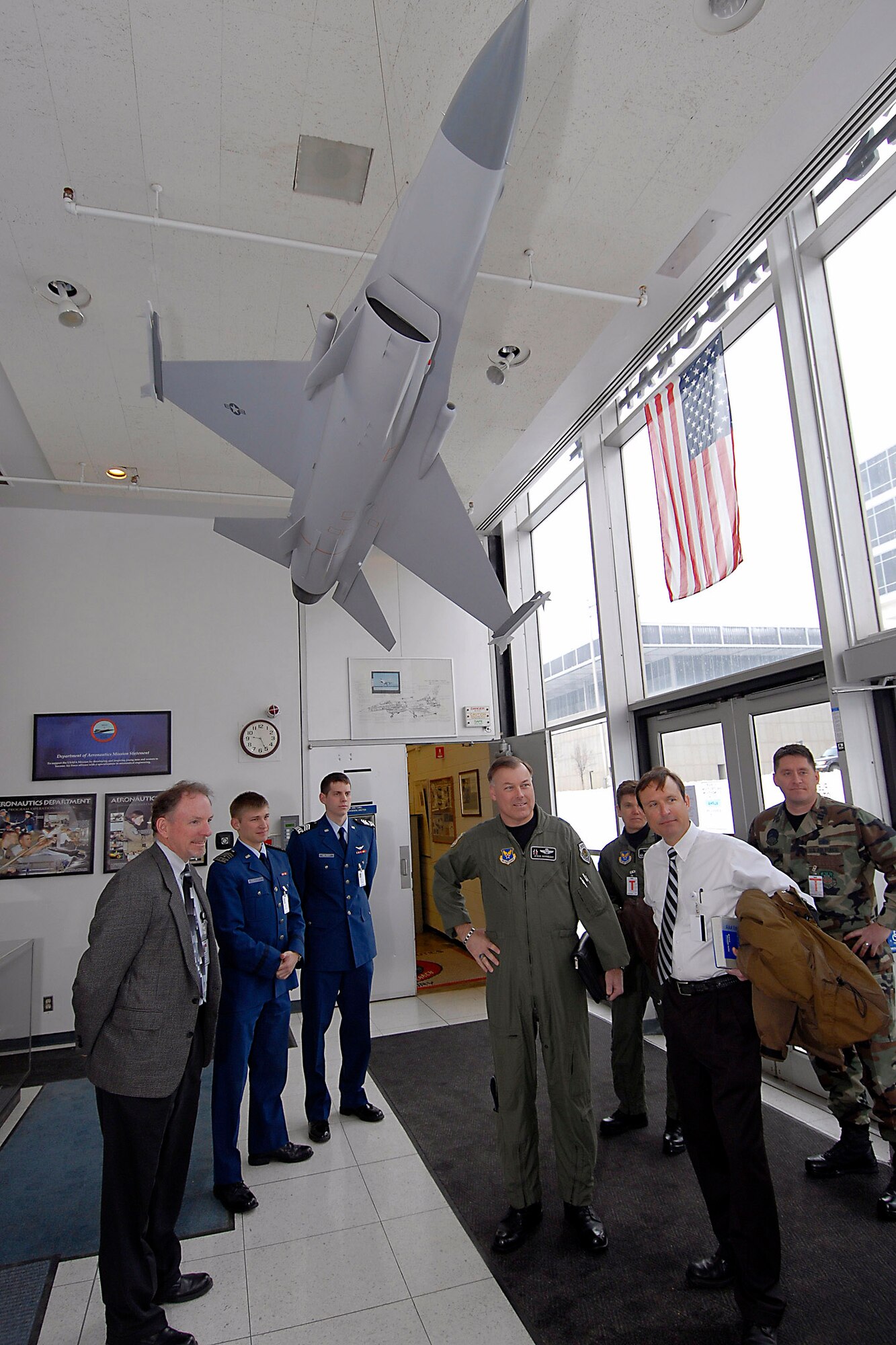 Maj. Gen. Stephen T. Sargeant (middle) is greeted by U.S. Air Force Academy faculty members and cadets during a March 17 visit to the Academy in Colorado Springs, Colo. The visit included the formal signing of a memorandum of agreement between the Air Force Operational Test and Evaluation Center and the Academy creating a comprehensive mentoring program to assist Academy cadets during their academic and professional development. General Sargeant is the Air Force Operational Test and Evaluation Center commander from Kirtland Air Force Base, N.M. (U.S. Air Force photo)
