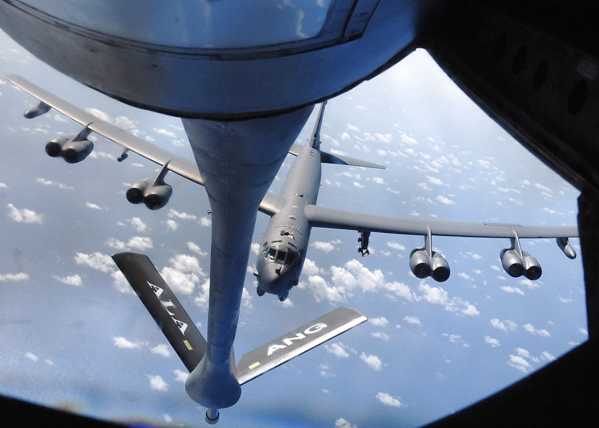 A B-52 Stratofortress prepares to receive fuel from a KC-135 Stratotanker during a practice aerial refueling mission March 19 near the Mariana Islands. The KC-135 is from the 106th Air Refueling Squadron of the Alabama Air National Guard and the B-52 is assigned to the 96th Expeditionary Bomb Squadron from Barksdale AFB, La. (U.S. Air Force photo/Staff Sgt. Vanessa Valentine) 
