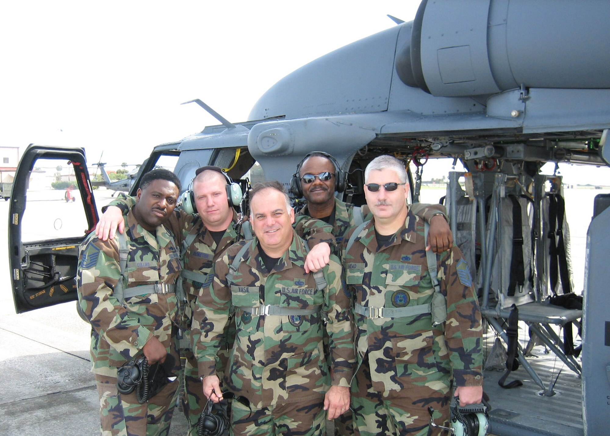 333rd Recruiting Squadron recruiters prepare to board an HH-60G Jolly Green helicopter Feb. 22 to witness combat, search and rescue skills in action at Patrick Air Force Base, Fla. During the day, the recruiters also experienced an in-flight aerial gunnery and terrain masking demonstration. (Courtesy photo)